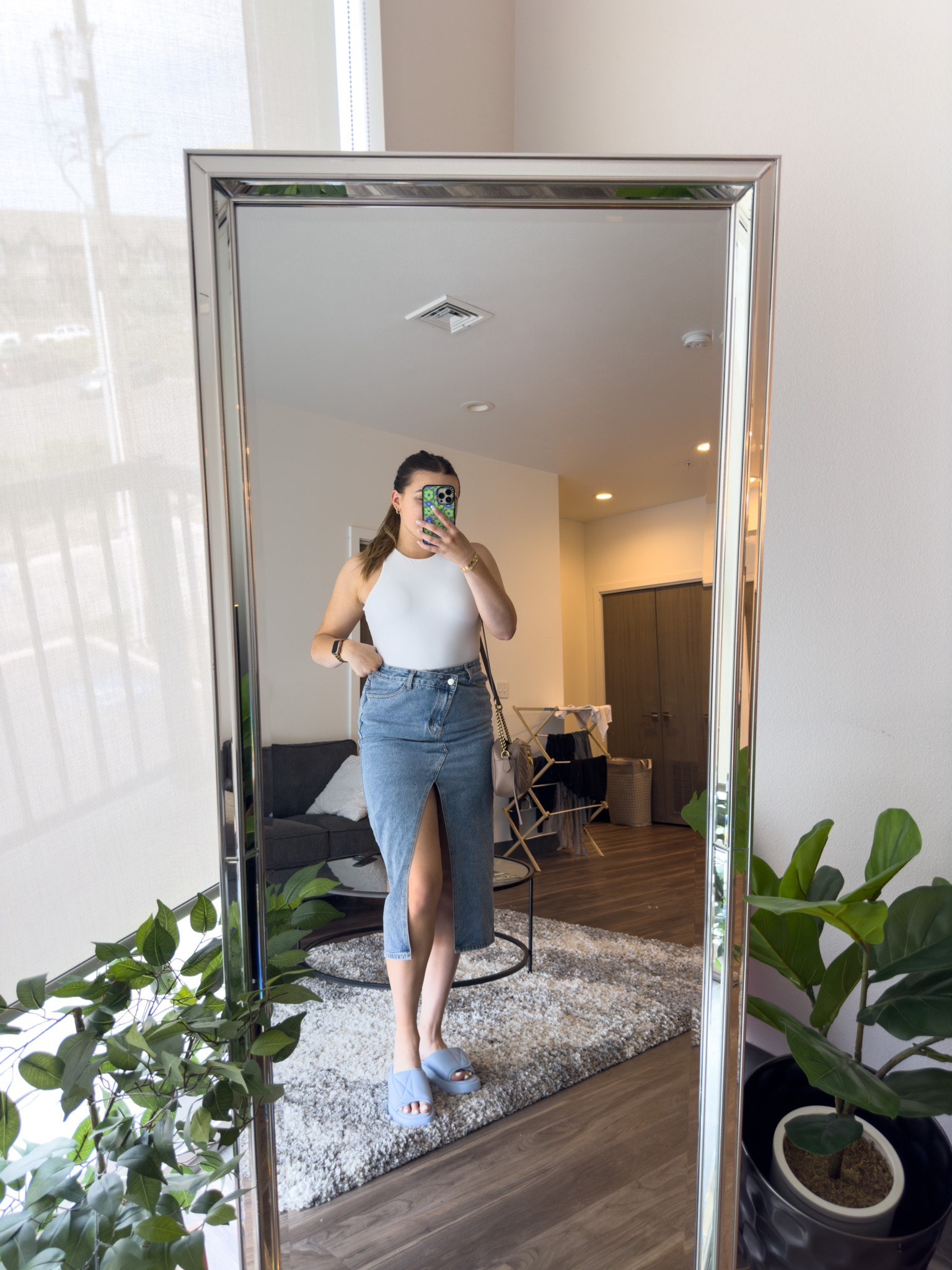 Casual spring outfit idea! Featuring my favorite bodysuit from Abercrombie and the perfect denim midi skirt. 

I’m wearing a M bodysuit, L skirt and size 9 sandals 

#LTKunder100 #LTKstyletip #LTKSeasonal