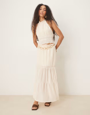 ASOS DESIGN textured sleeveless halter neck top with open back in cream - part of a set | ASOS (Global)