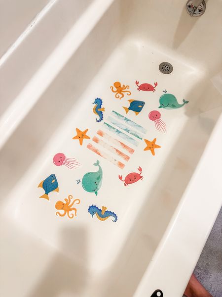 I was getting tired of scrubbing mold off our previous cushioned bath mat, so I finally decided to go for some non-slip bathtub stickers that I thought would be so fun for the kids! These ocean animals have such fun bright colors, and these bright gold-flecked strips provide some extra non-slip coverage in the center of our tub.

#LTKFind #LTKkids #LTKhome