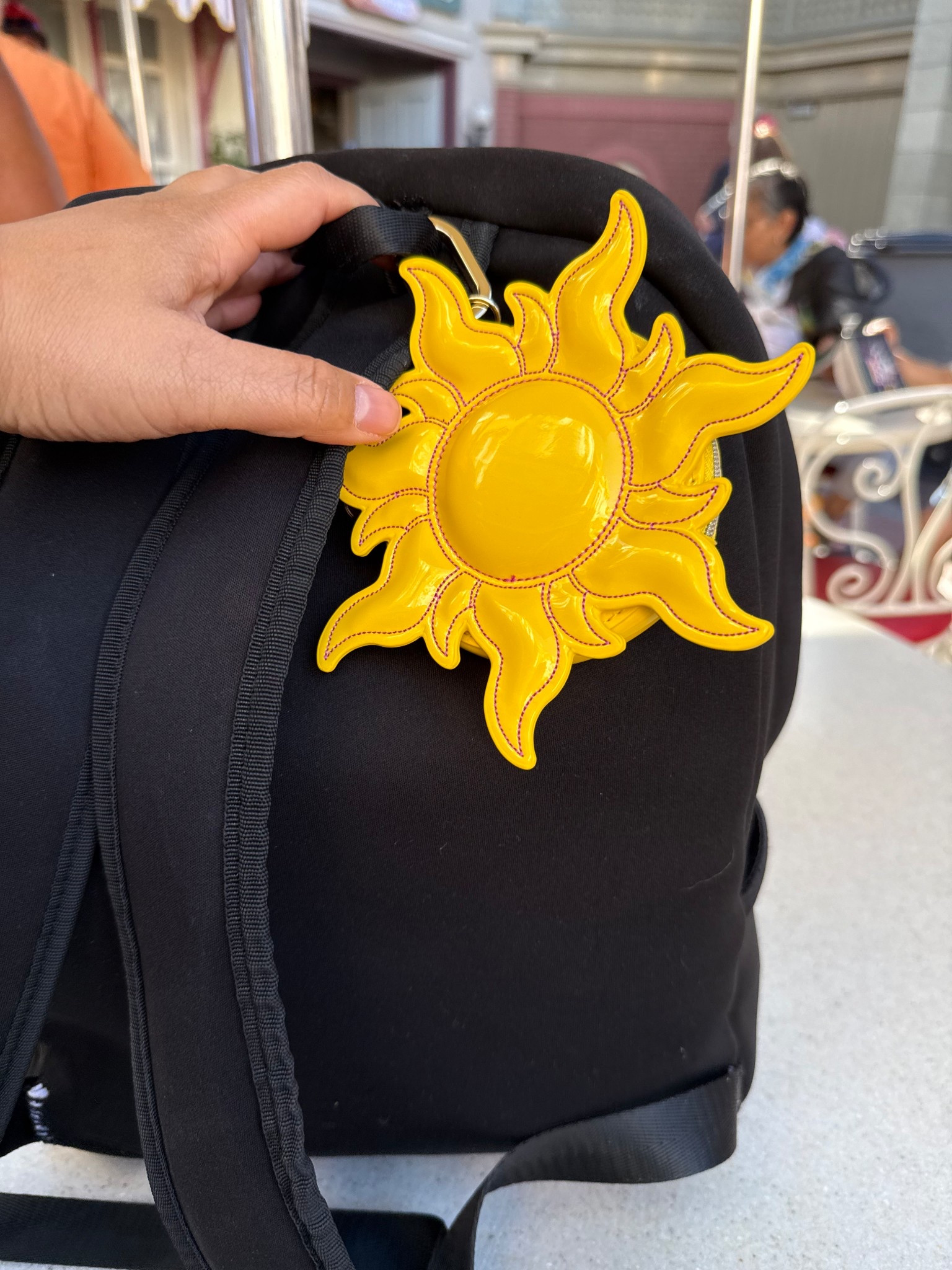 rapunzel coin purse | black backpack | Disney accessories | what to wear to Disneyland | what to bring to Disneyland 

#LTKootd #LTKTravel #LTKdayinmylife