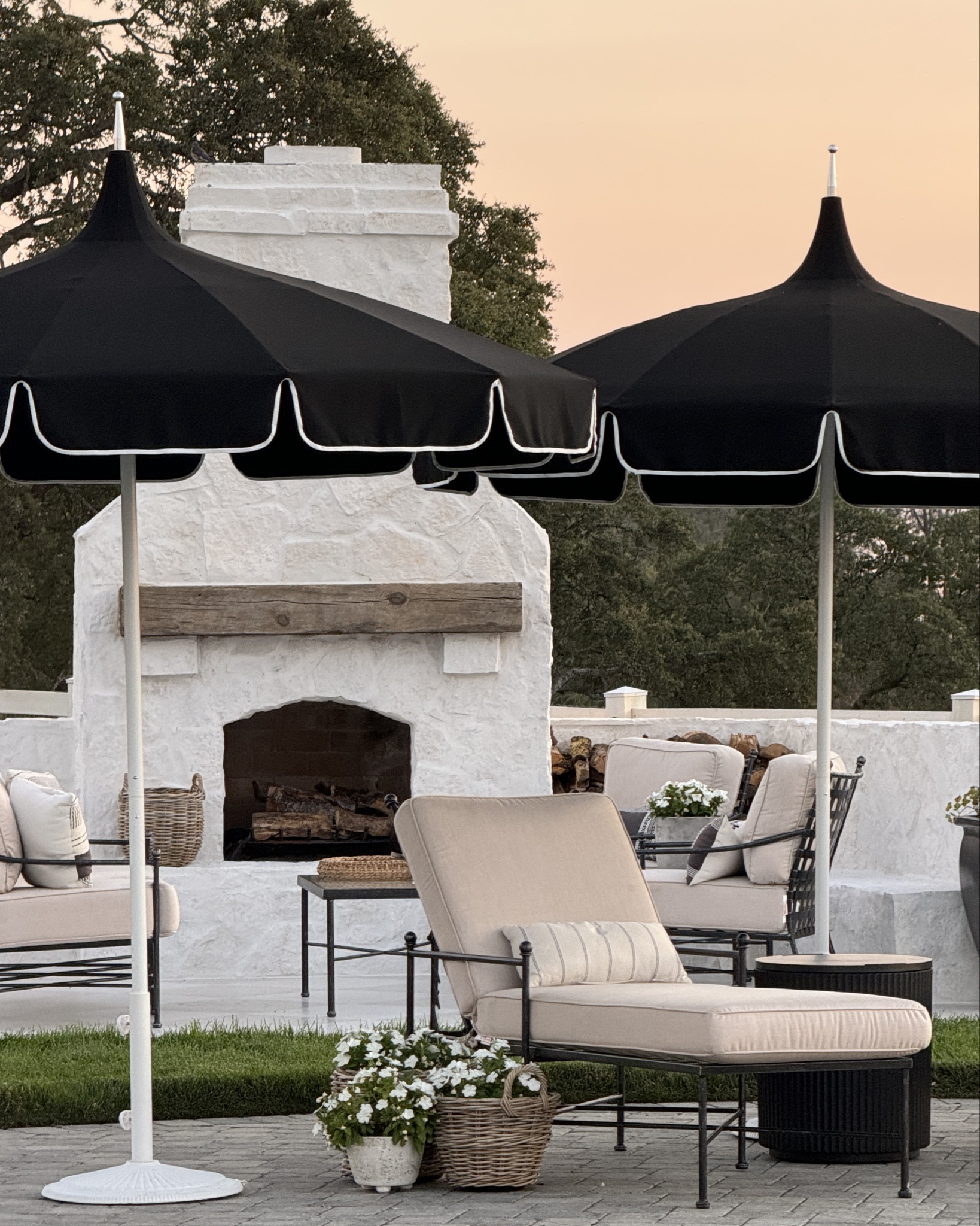 Still love our outdoor iron furniture!  The Sunbrella fabric holds up year after year!  Our umbrellas are also Sunbrella and they look just like they did when we got them!  Linking our porcelain tile we used out here too!  We used matte white & matte silver!

#LTKSaleAlert #LTKHome
