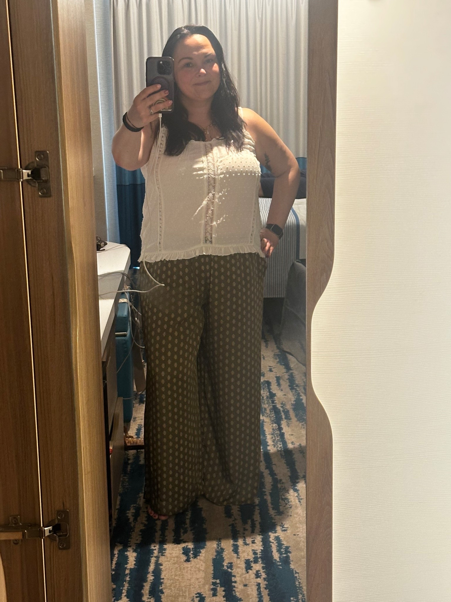 Wore this to board the cruise ship. Loose wide leg elastic waist pants and a lace cami were comfortable for waiting in for security, sitting in the waiting area, and lounging on the Lido deck. 

#LTKootd #LTKMidsize #LTKTravel
