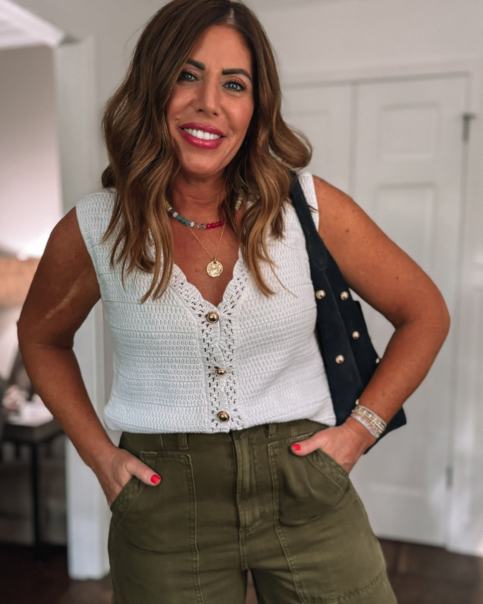 Light v neck sweater - perfect for spring into summer / on sale only $19.98. I'm wearing a medium. My bag is old from Madewell.

#LTKSaleAlert #LTKOver40 #LTKMidsize
