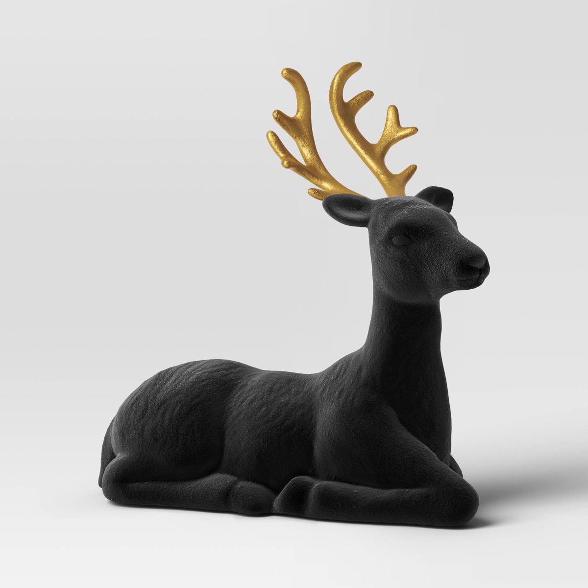 Flocked Sitting Deer Animal Christmas Figurine - Wondershop™ Black/Gold | Target