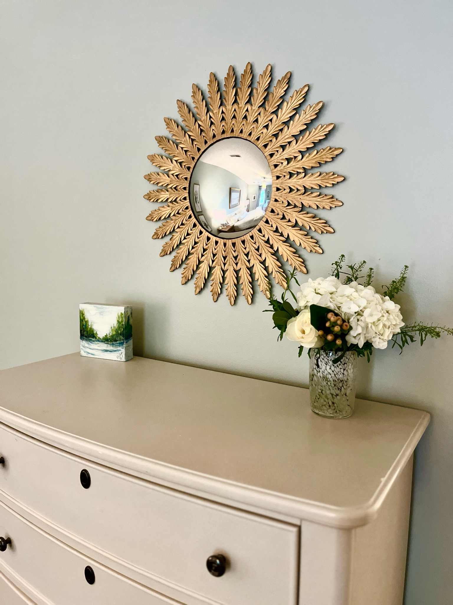 The mirror and vase are secondhand finds but I’ve linked similar ones! The art is an original by Elisabeth Neill. Vase is Thomas O’Brien. The linked mirror is smaller but closest I could find.