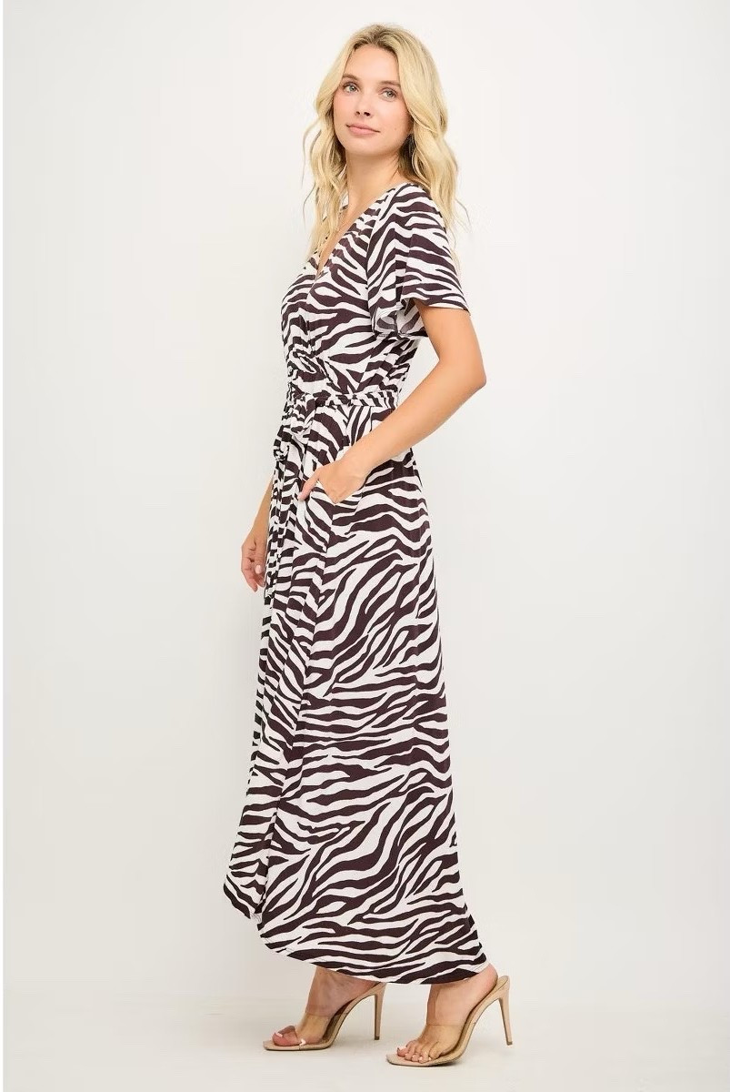 This zebra print wrap maxi dress from Target is such a good pick for your Easter outfit or spring plans 🐣🤍  

The flattering wrap fit + flowy high-low hem makes it perfect for spring dresses, Easter outfits for women, brunch, or vacation looks. It’s lightweight, comfortable, and still looks put together with zero effort.  

And it gets better 👀 this dress is part of Target Circle Deals, so it’s the perfect time to grab it for less  If you’re looking for a dress women can wear for Easter and beyond, this is one of those easy, throw-on-and-go pieces ✨

#LTKmomlife #LTKSaleAlert #LTKTravel