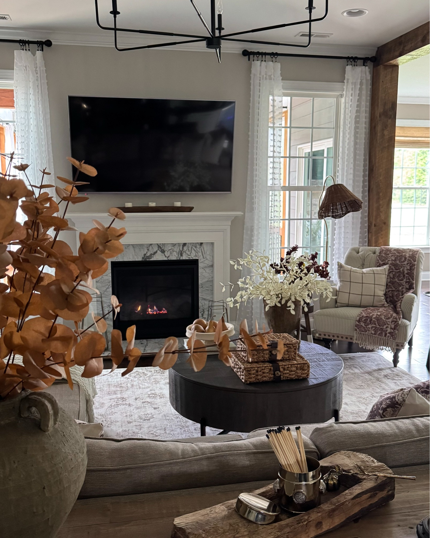 Welcome Fall Into Your Home🤎🍂
I added natural elements, layered accents, cozy textiles and warm-toned stems.

Gourds, vintage inspired pumpkin candle snuffer, fall pillow covers, pillow inserts, console table, ottomans, floral throw blanket, black candle pedestal, taupe vase, fall stems, pedestal bowl, brass canister, black matches, vintage wood tray, upholstered chair, floor lamp with woven shade, burgundy floral throw blanket, woven storage boxes, eucalyptus stems, vintage wood mortar


#LTKSeasonal #LTKHome #LTKstorytime