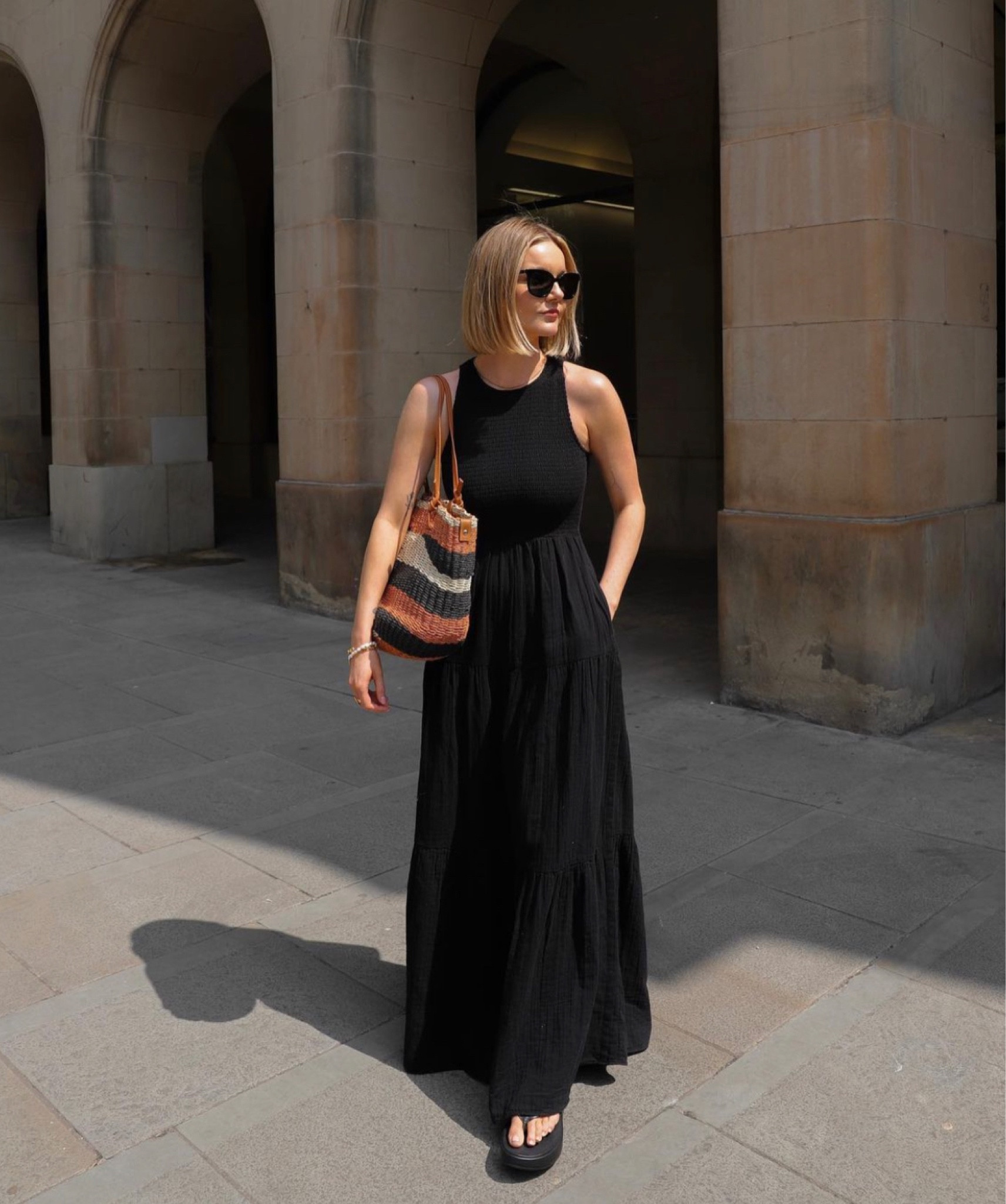 Black maxi dress, halterneck, black platform sandals, striped wicker tote bag, black sunglasses, sunnies 

#LTKeurope #LTKSeasonal #LTKstyletip