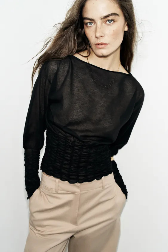 Model height: 178 cmSemi-sheer knit jumper with a boat neck and long sleeves. Featuring elasticat... | Zara DE