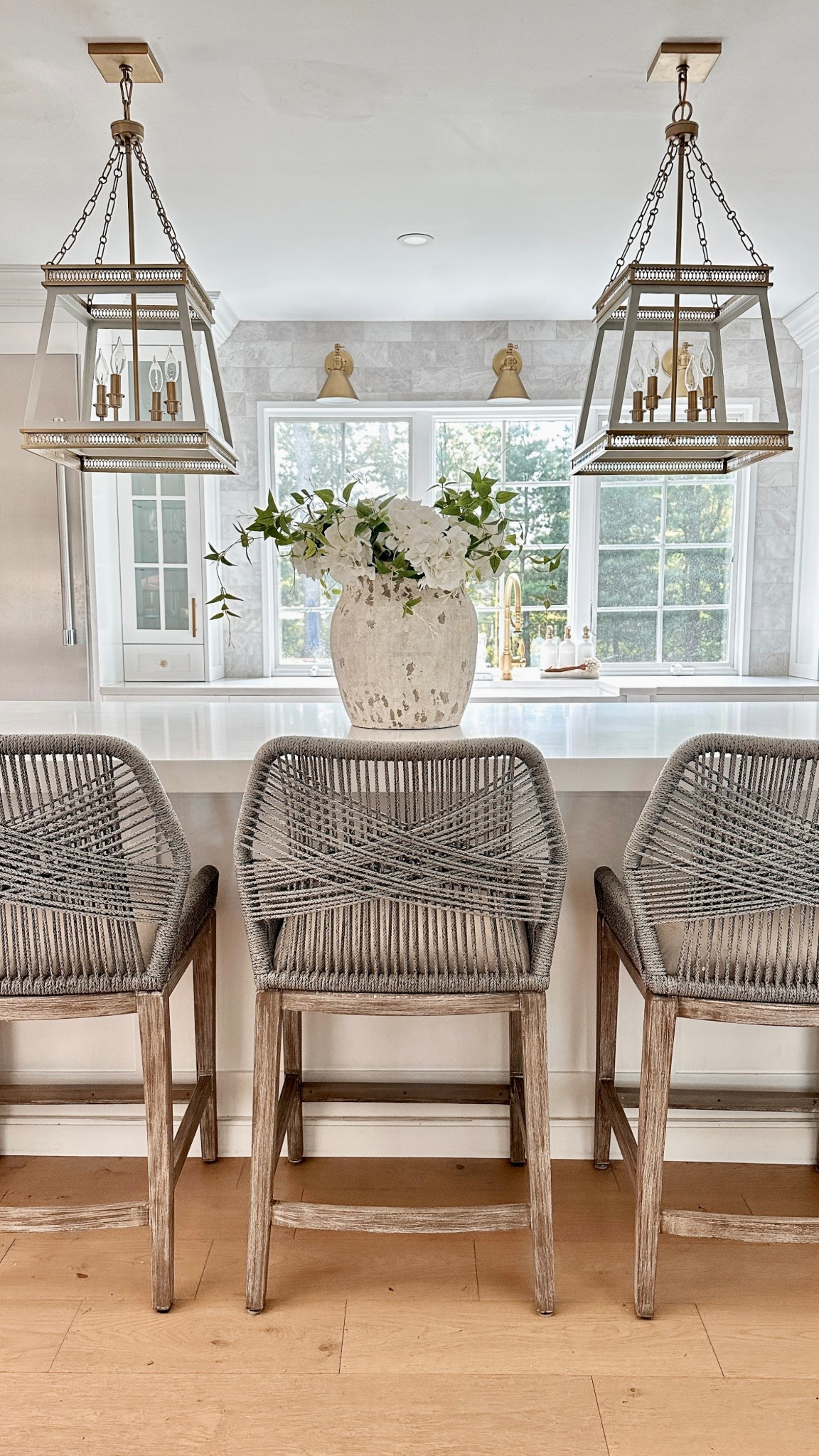 Kitchen island counter stools, oversized vase, artificial spring hydrangeas and greenery, lighting, backsplash, sink, faucet. ✨

Follow @dpiahome on Instagram + TikTok for more home decor inspiration, DIY, style, deals, & affordable finds. 🤎

home decor | living room | bedroom | dining room | kitchen | office | outdoor living |spring decor | look for less | deal | sale | summer | travel | lifestyle | family | new arrivals | vintage | rustic | organic modern | cozy | Amazon | Walmart | Target | Wayfair 

#LTKHome #LTKSaleAlert #LTKFamily