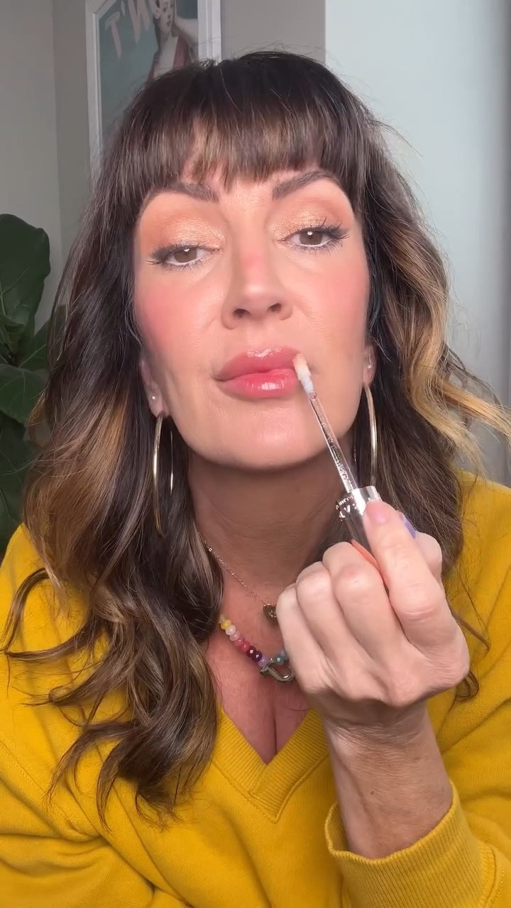 💁🏻‍♀️I can’t ever resist trying a viral makeup hack/trend! I think this only works if your eyebrow pencil is not too dark AND if you use a cream or liquid blush. The thought behind using a brow pencil works bc it creates a shadow-look around the perimeter of the lips which gives the illusion of them looking fuller, instead of adding actual color to the lips. // My shades used : @morphe2 micro brow pencil in “latte” @milkmakeup cooking water jelly tint blush stick in “spritz” and @anastasiabeverlyhills luminous tinted gloss in “honey diamond” // shop my look details via the @shop.ltk app and get my exclusive app only content! #ltkbeauty #ltkunder50 #ltkover40 #makeupreels #beautyhacks #viralbeauty