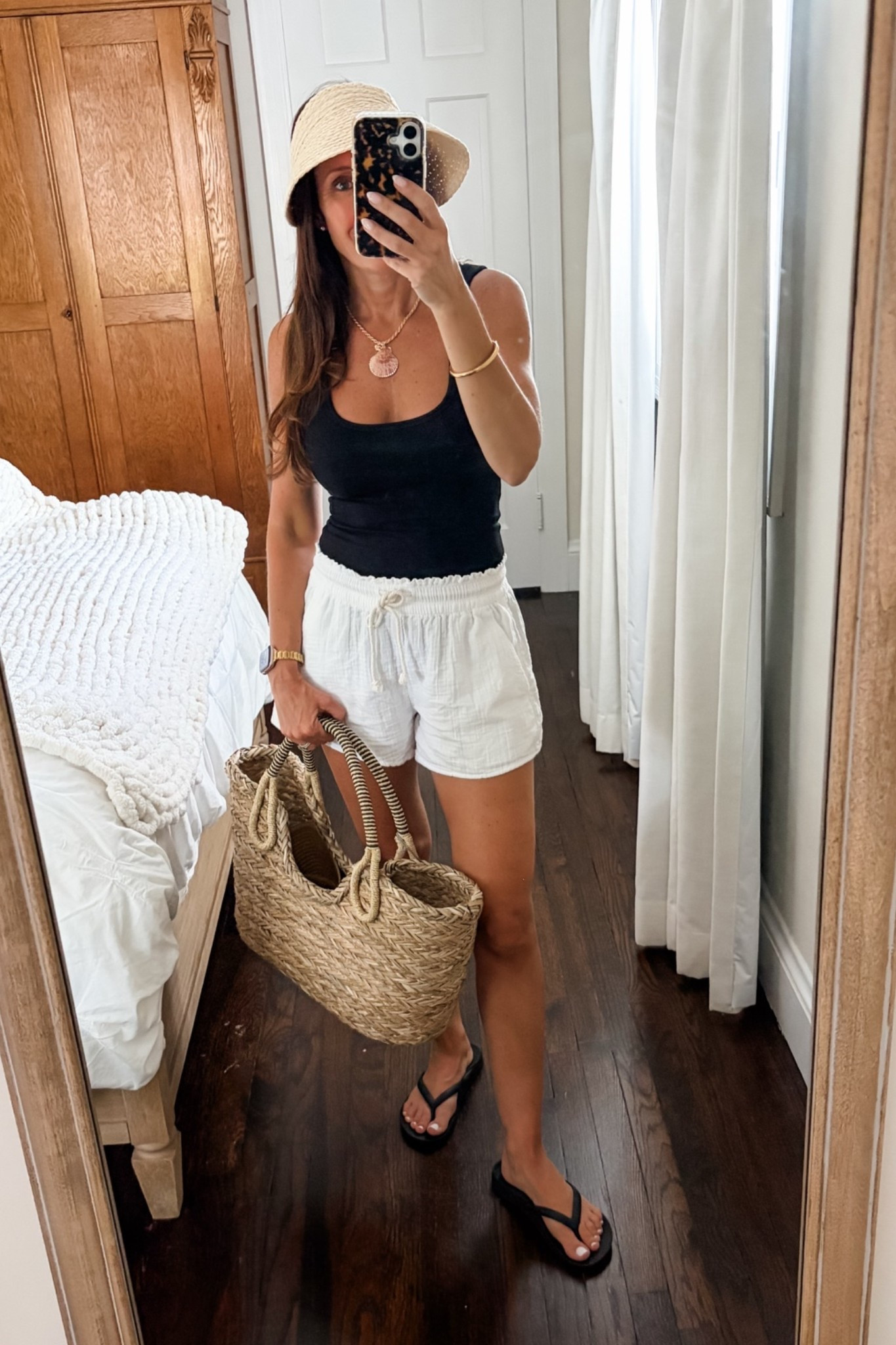 Target tank with built in bra, straw bag and hat from Target, shorts by Old Navy.  Wearing an xs in everything.

#LTKSaleAlert #LTKSeasonal