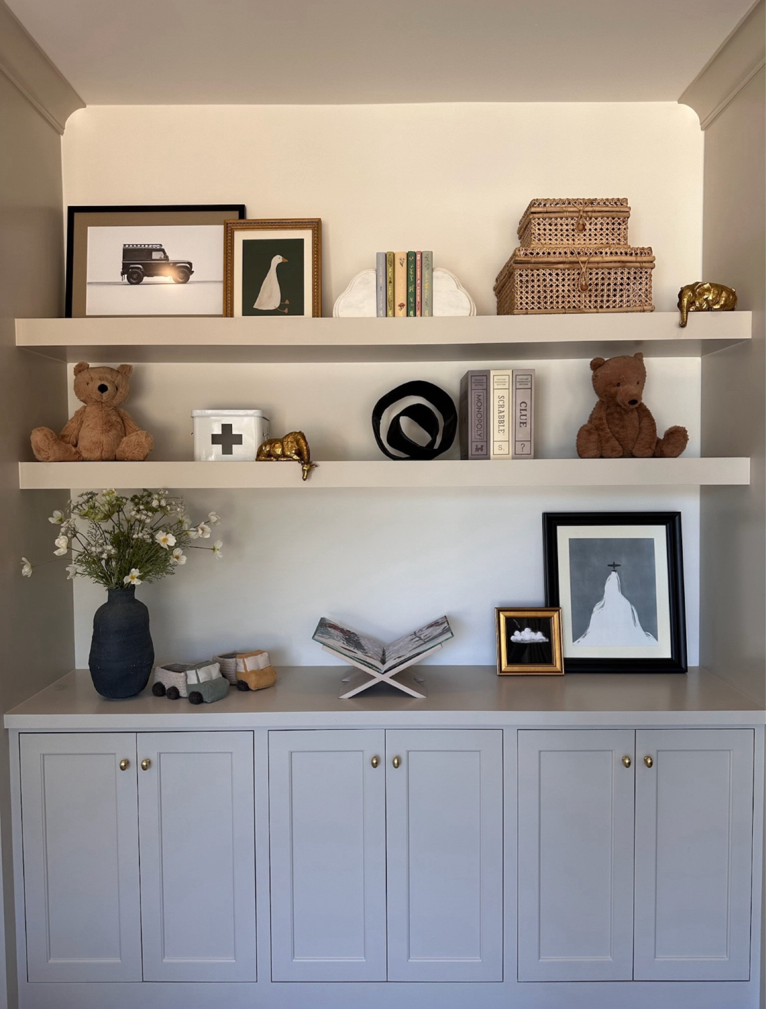 How I style my shelves in the playroom  
Playroom// nursery decor, baby blanket, pillow covers, mirror, wall shelf, bookcase, wallpaper, home decor, nursery ideas, neutral home decor  #ltkstyletip #ltkhome

#LTKBaby #LTKHome #LTKKids