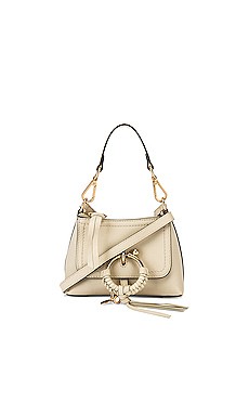 See By Chloe Joan Mini Crossbody in Cement Beige from Revolve.com | Revolve Clothing (Global)