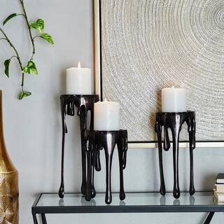 CosmoLiving by Cosmopolitan Black Aluminum Pillar Candle Holder with Dripping Melting Designed Le... | The Home Depot