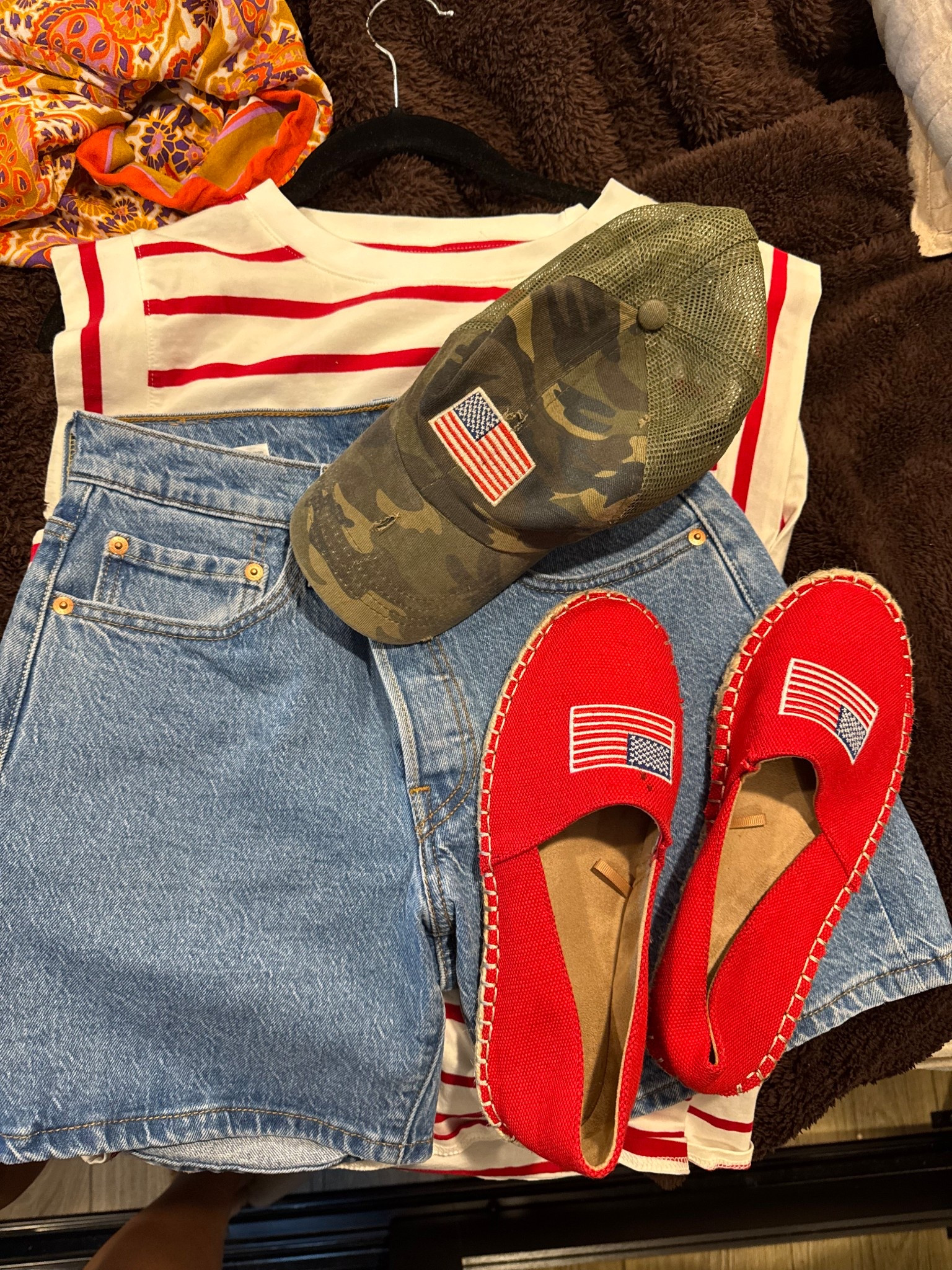 Effortless style for the 4th of July is so easy with a few basic pieces! Levi shorts, stripe top from Amazon, camo hat I’ve had for several years and shoes from last year Maurice’s, but you can find them on Poshmark and EBay. 

#LTKOver40 #LTKStyleTip #LTKShoeCrush