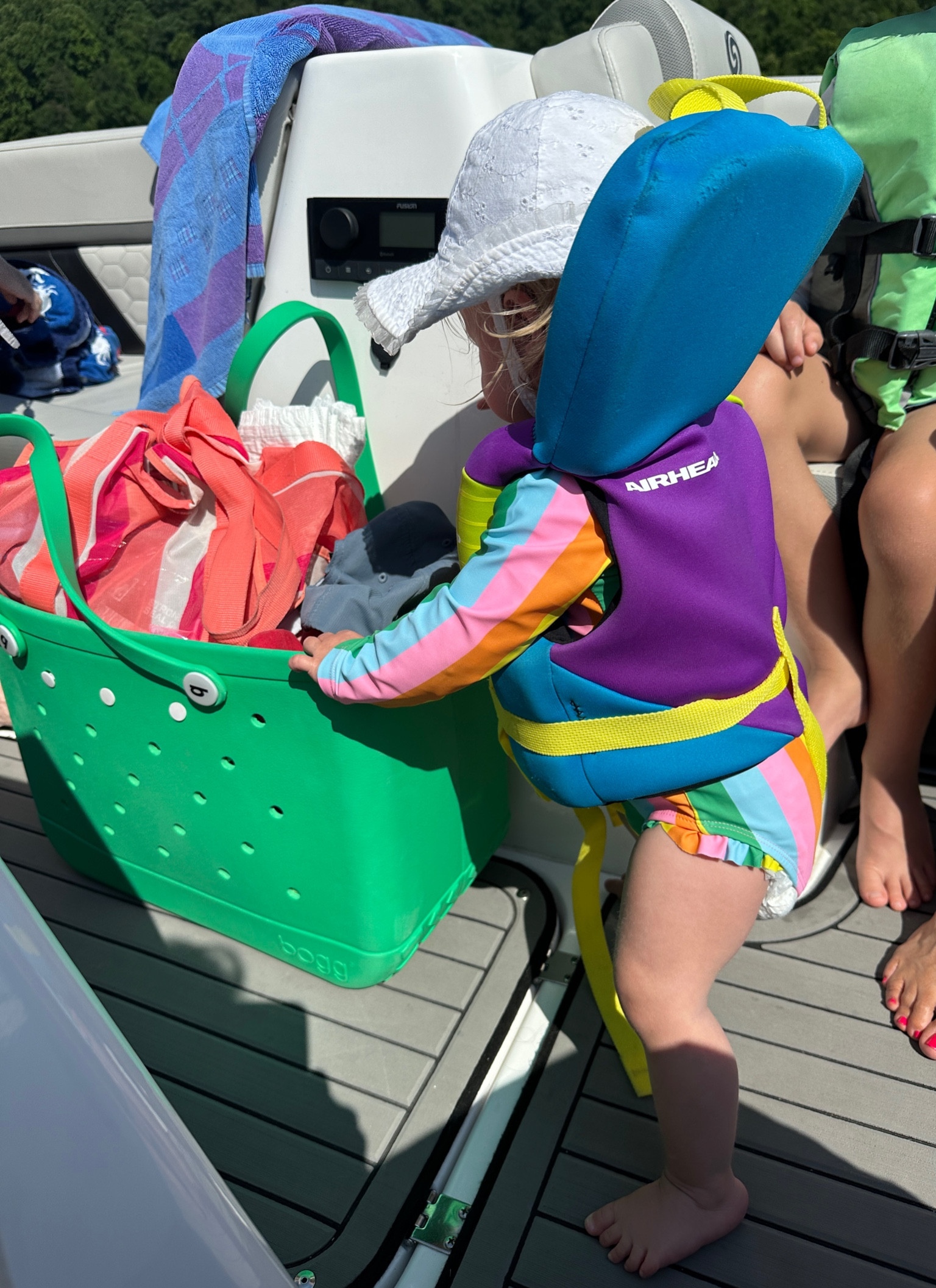 Toddler girl boat/ pool essentials! Best infant life vest and the cutest pool bows ❤️

#LTKParties #LTKPlusSize