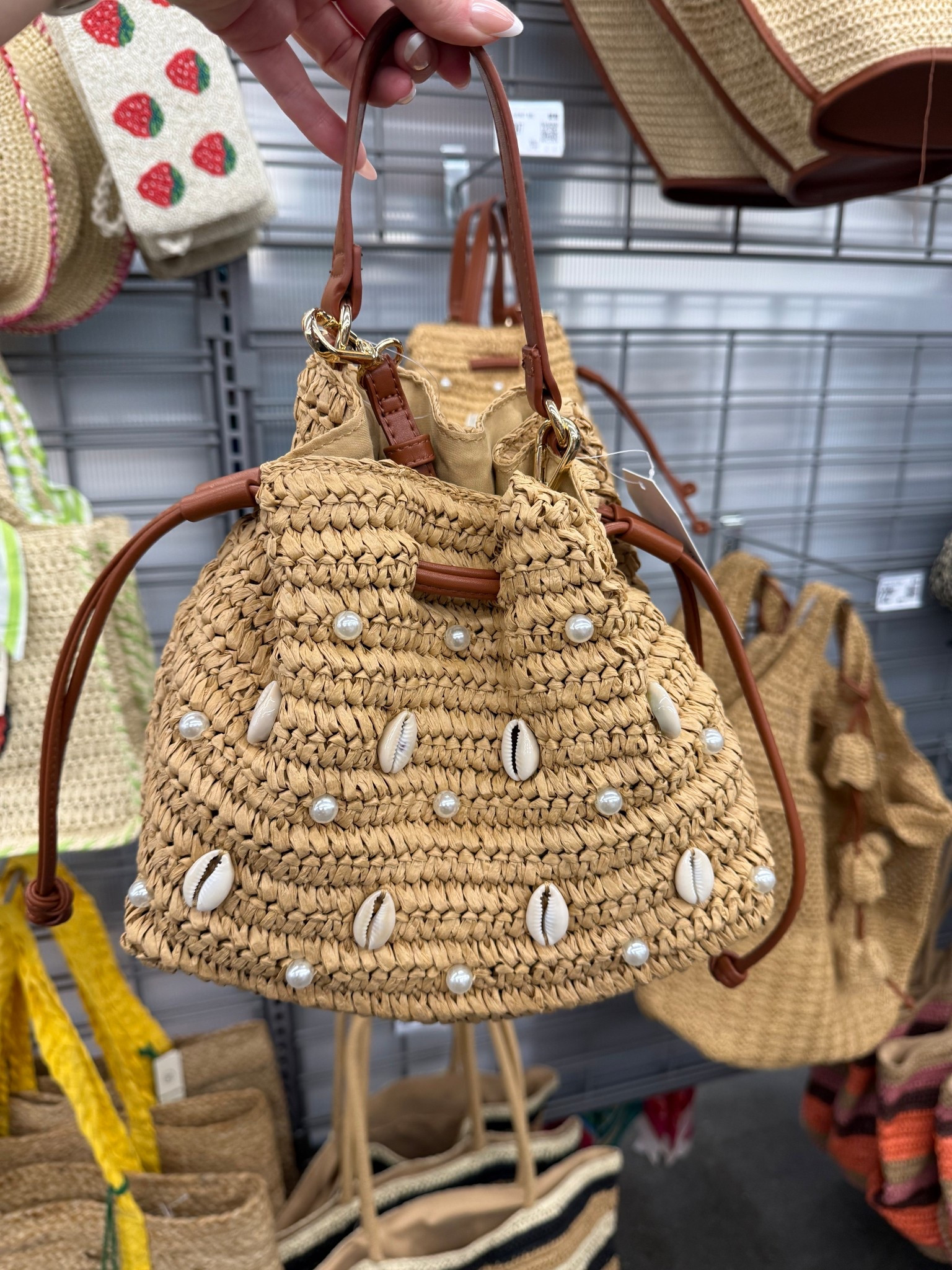 This might be the cutest most perfect bag for summer. Has a handle and a crossbody strap. The little shells and pearls are such a cute detail. I can’t believe this purse is under $20. 

Purse, summer purse, summer bag, crossbody bag, rattan bag, bucket bag 

#LTKSwim #LTKU #LTKTravel