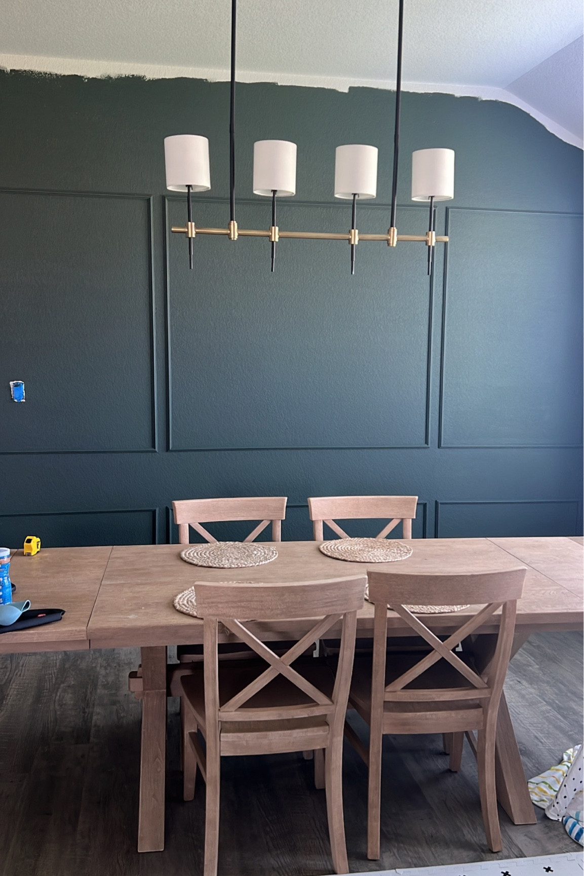 Green paint | pottery barn table | crown mounding | dining room | light fixture 