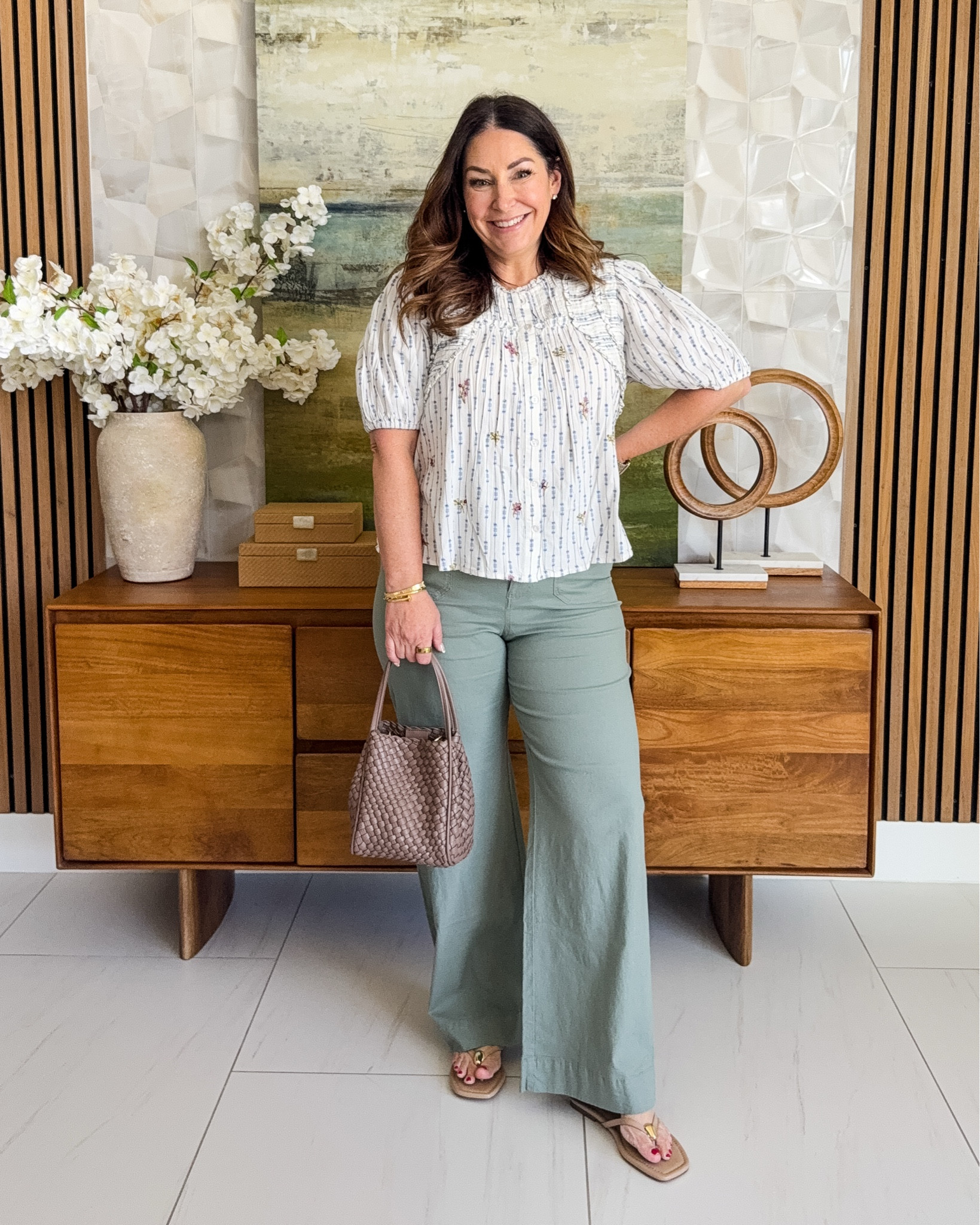 Spring dressing made easy! 🌸 This puff sleeve floral top paired with sage wide leg linen pants is giving all the good vibes. The woven bag and flip flops complete the look perfectly — casual enough for errands, cute enough for lunch with friends.
📏 Sizing: Top tts, L // Pants tts, 31 

#LTKstyletip #LTKfindsunder100

#LTKOver40 #LTKSeasonal #LTKMidsize