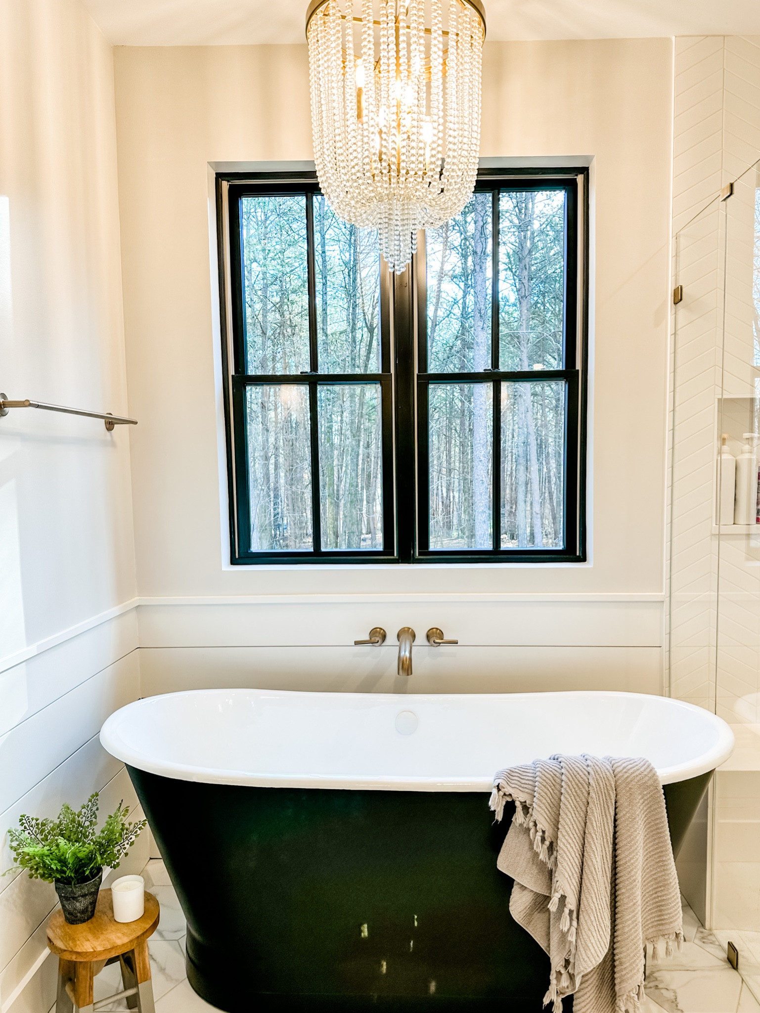 Love my black bathtub and the chandelier ain’t too shabby either. 

#LTKhome