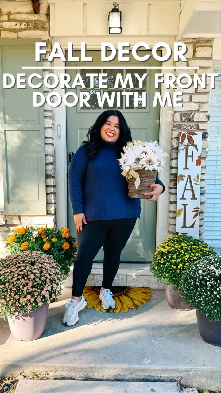 🍂FALL FRONT DOOR DECOR 🍂Smiles and Pearls picked up some items at Michael’s to decorate her porch with. She started with some potted plants and then added a basket with flowers. This came premade and she didn't have to create a wreath.
🍂 Candice then added the wooden sign and a sunflower doormat.
Door mat is currently on sale for $8!!! 
Fall decor, front door decor, fall door decor, fall season, fall decorations, plus size fashion, thanksgiving, family photos

#LTKhome #LTKSeasonal #LTKplussize