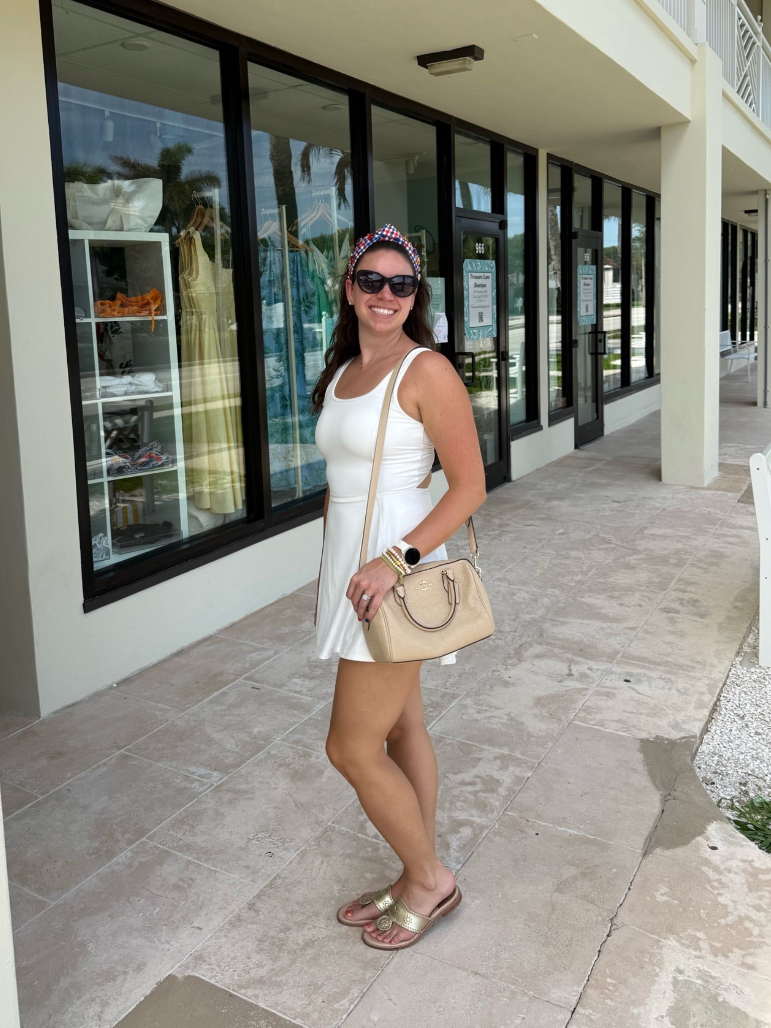 OOTD: halara dress for the win! These dress are perfect for travel and heat! If you haven’t tried them yet, you need to now! Paired with my favorite COACH bag, Jack Rogers sandals, Goodr sunnies and a super cute Americana headband

#LTKootd #LTKgrwm #LTKdayinmylife