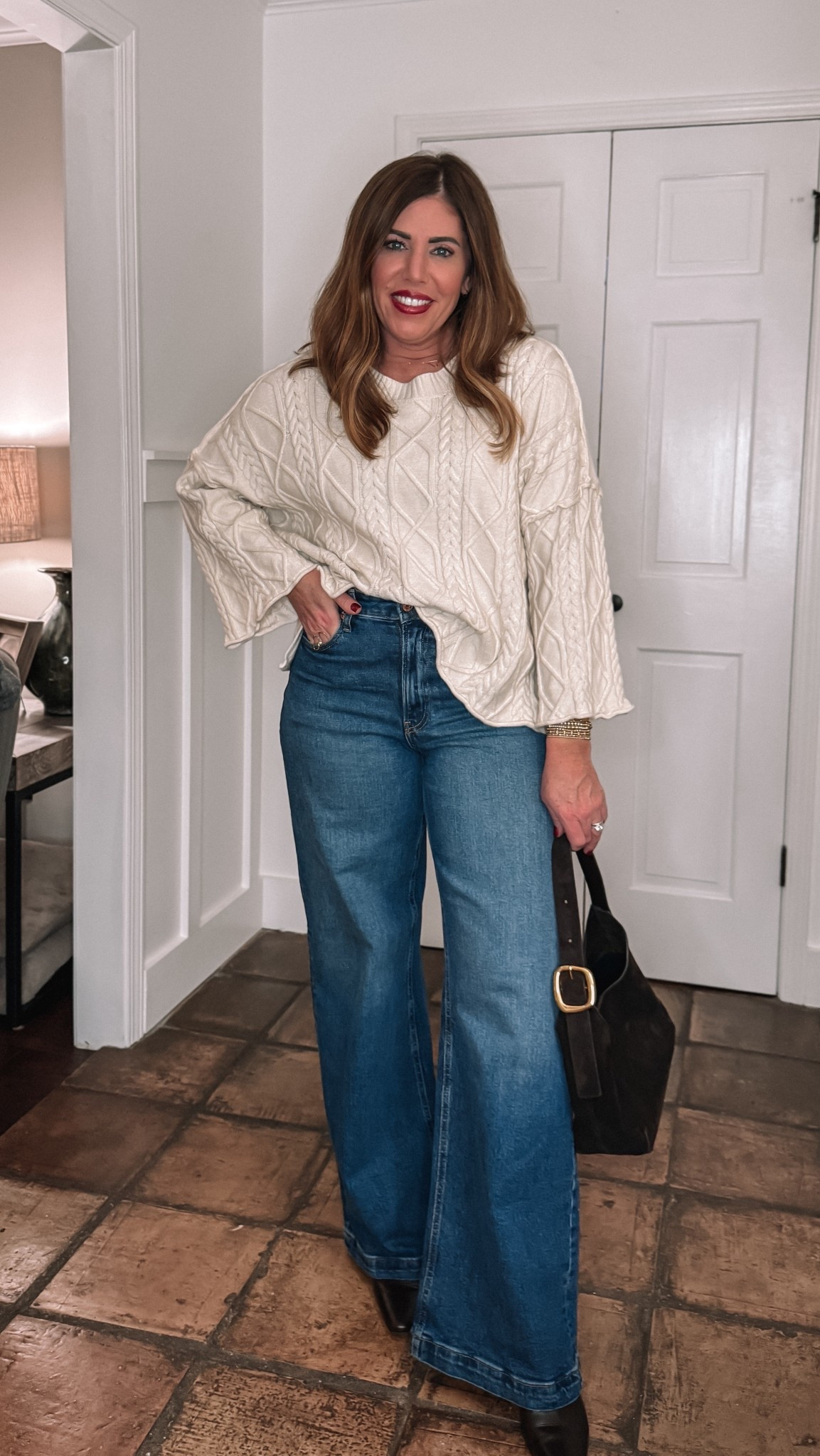 Casual winter outfit: Amazon look for less sweater size large. So comfy, amazing quality I love the fit. It has dropped shoulders slits at the bottom sides and wide sleeves.

High-rise wide leg jeans fit just like my Pistola for way less. They’re currently on sale 20% off. I am wearing a 28 long.

Low kitten, heeled, dark chocolate, brown leather boots from Madewell
Suede shoulder bag from Madewell 



#LTKFindsUnder50 #LTKSaleAlert #LTKOver40