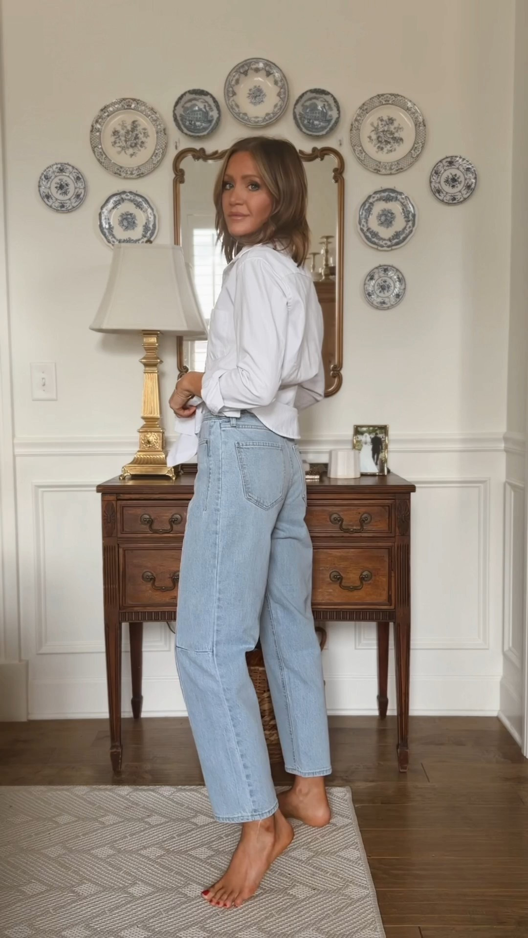 Small in white button down 
Small in red sweater 
Small in navy blazer 

