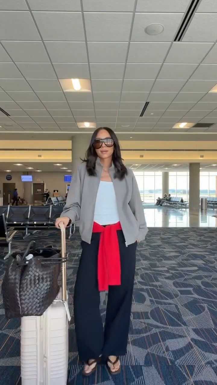 Travel outfit to the US Open ✈️ These pants are so great for traveling! They don’t wrinkle and still make me feel my airport outfit feel together! Wearing size S white tank, size S plaid jacket, size S red cardigan and size S black pants

#LTKTravel #LTKSeasonal