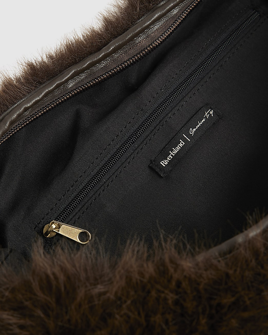Brown Faux Fur Snaffle Slouch Bag | River Island UK & IE