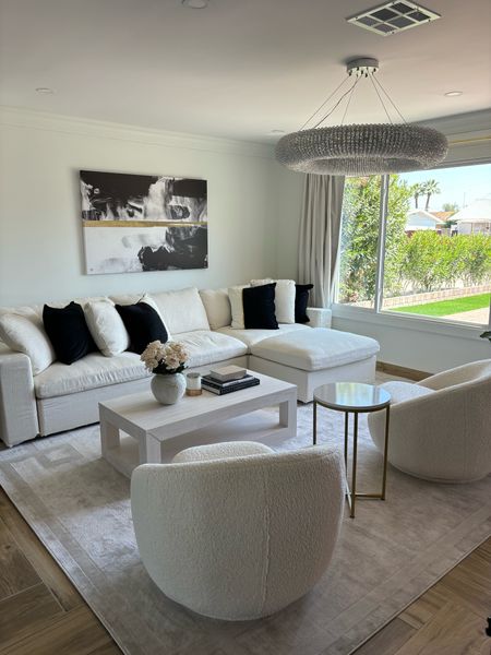 Neutral living room, best ivory sectional, coffee table, boucle chairs, pretty white living room, Amazon decor, Amazon art, Airbnb living room, Pinterest living room 

#LTKstyletip #LTKhome