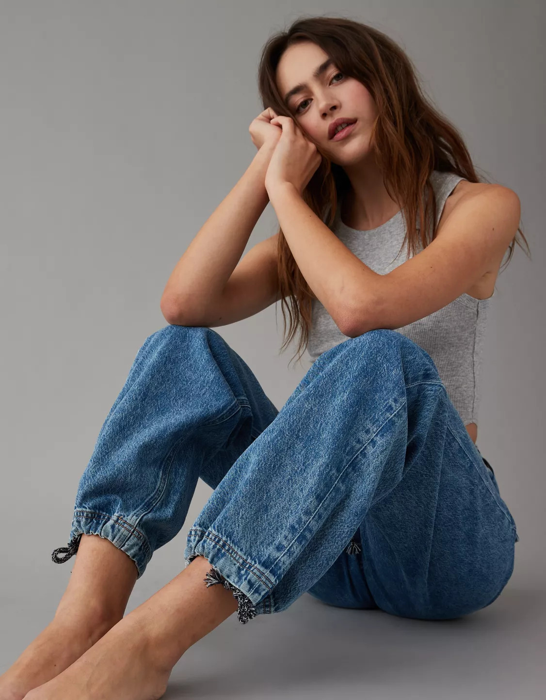 AE Dreamy Drape Stretch High-Waisted Baggy Cargo Jogger Jean | American Eagle Outfitters (US & CA)