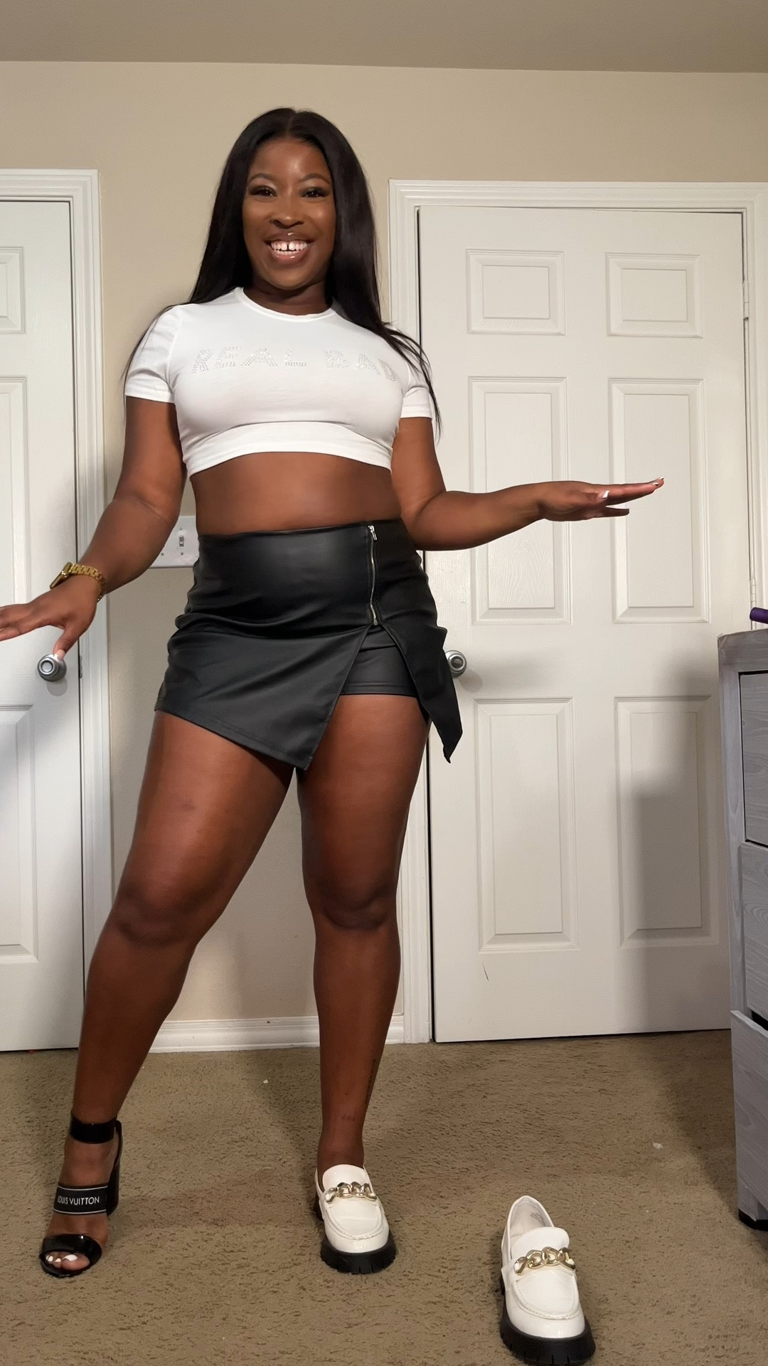 Grwm for  date night of bar hopping I wanted to be comfortable so I paired this cute rhinestone crop with this faux leather skort from shein  which shoes should I wear with it though 

#LTKfit #LTKcurves #LTKstyletip