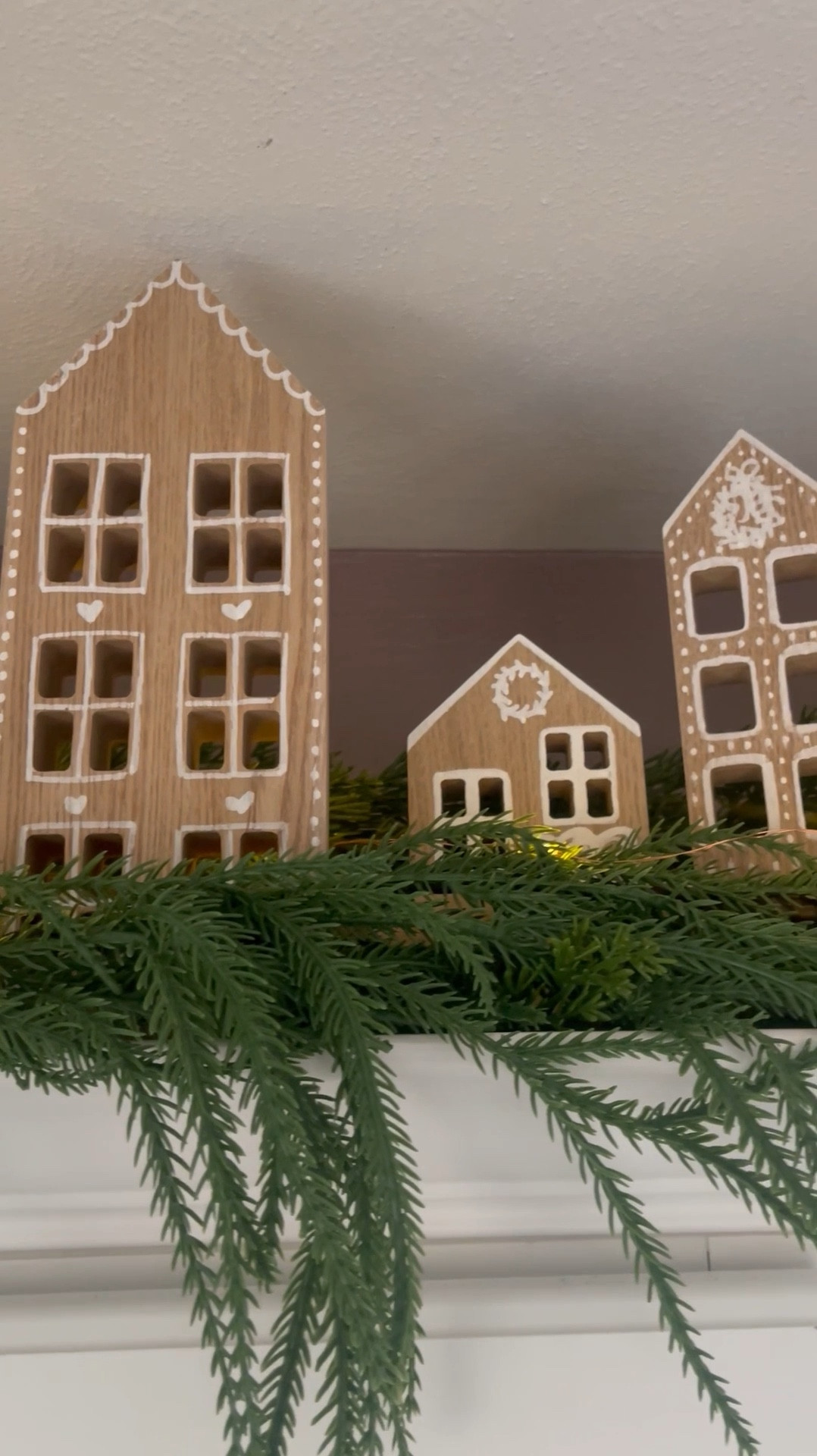 Guys, this was so quick and easy a caveman could’ve done it.🤎 I’ve collected wooden houses for years and lately I’ve been doing little customizations to make them fit for every holiday. And if you’ve been following me for a while then you know that last Valentine’s Day I did a two second DIY to easily make them pink and flirty! 💕🎀 (I’ll be sure to share that again in a couple of months)

But my favorite trend for this Christmas is gingerbread everything and I couldn’t think of a better way to glow-up these villages. ✨ I can still flip them around to be solid wood and make them work as decor for the rest of the year or I can paint this side a solid color for yet another look. I just love that the possibilities are endless.

Stick around as we go through more holidays because I’m sure I’ll be finding more ways to reuse these in the future!

🗣️🗣️Comment “gingerbread” if you want the materials I used for this project as well as links to my garland and lights.

#gingerbreadhouses #gingerbread #christmascheer #christmasdecor #christmasdecorating #christmasdecorations #christmasvillage #christmashouse #christmasgarland #christmasdiy #christmascraft #christmascrafting #gingerbreadvillage #diygirl #diymom #diymommy #woodenhouses #shelfdecor #christmaskitchen #xmasideas #christmasideas #fyp #homedecorideas #homedecordiy #diydecor #diyideas #doodleaday #diys #tutorials #diyproject

#LTKHome #LTKSeasonal #LTKHoliday