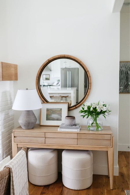 For this living room console table look, I styled round Ottomans underneath my target console table. On the table, I styled a target table lamp and frame, along with a glass vase. And above, you’ll find a woven round mirror.

#LTKSeasonal #LTKFind #LTKhome