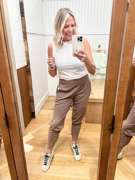 Love these athleta beige joggers with a cream Sleeveless top and golden goose. Size small joggers and tank. Both come in other colors. Activewear casual fall outfit ideas 

#LTKfit #LTKstyletip #LTKSeasonal