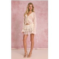 Cream Lace Ruffle Mini Skirt | PrettyLittleThing US