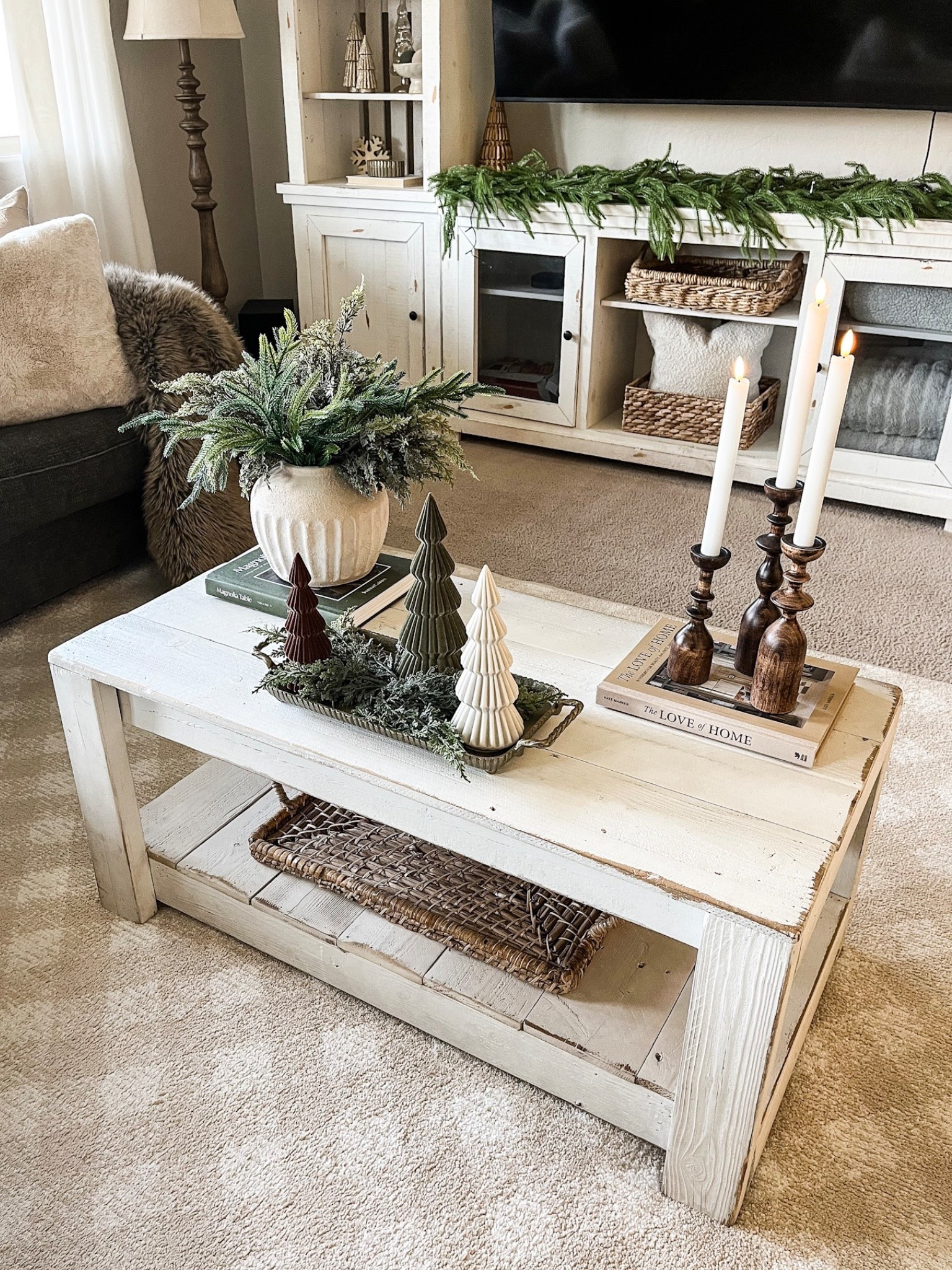 Neutral winter coffee table. 🌲

Follow @lifeinmyarizonahome on Instagram for more ideas and inspiration. 

I gave my coffee table a winter refresh with cedar and Norfolk stems, beautiful velvet winter trees, and warm wood candlesticks.  Flameless candles give a cozy vibe and they come with a remote and timer making it easy to set it and forget it!

#winterdecor #neutraldecor #stylewithme #coffeetabledecor

#LTKHome #LTKFindsUnder50 #LTKSeasonal