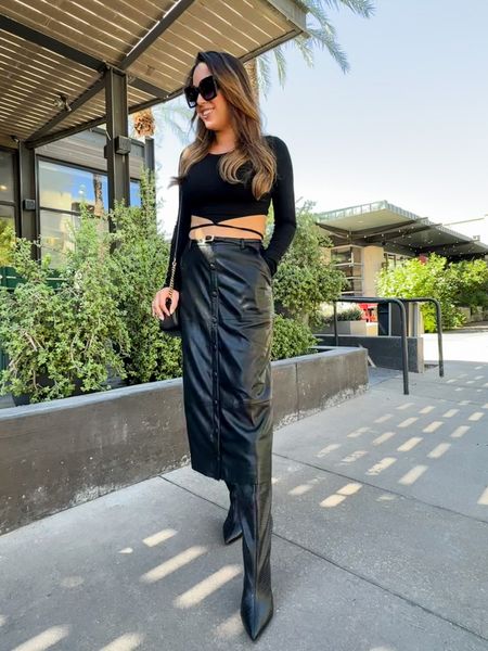 Faux leather black maxi skirt right on trend for fall! Runs large, sz down. Black crop top, maxi skirt outfit, black boots outfit, all black outfit, 

#LTKSeasonal #LTKstyletip #LTKover40