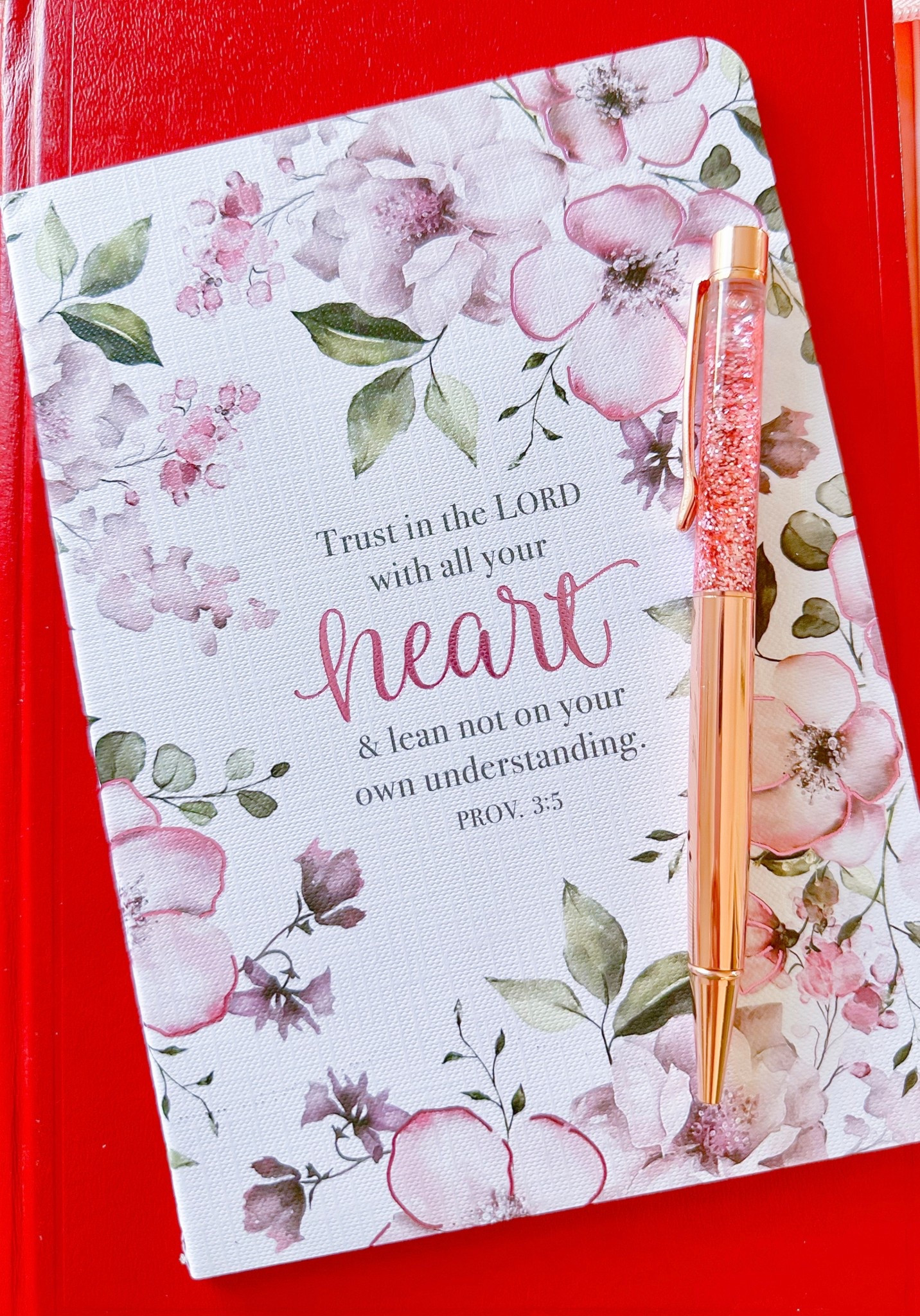 Prettiest Rose Gold with Pink Glitter Pen! Writes beautifully too! Set of 3 or 4 & comes with ink refills! Already put one in my Bible case! 

A pen plus a journal would be a sweet little gift! 

Yes my Bible is red haha it’s been my fave over 25 years & is sadly no longer in print. I did link some others

#LTKFamily #LTKStyleTip #LTKFindsUnder50