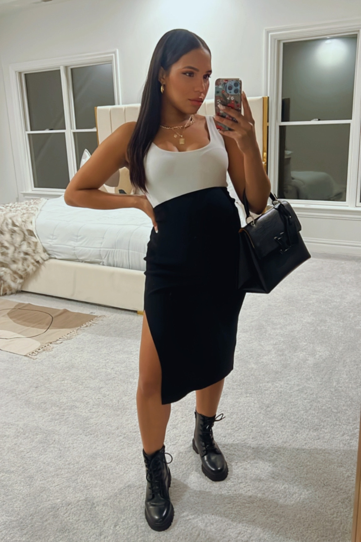 Maternity friendly outfit featuring knit sweater skirt and black combat boots. Wearing my true size in the skirt (S) but sized up to M in the bodysuit and up to 8 in the virador comfort. Currently 7 months pregnant and this skirt is AMAZINGLY comfortable. Skirt and boots on sale! 

#LTKsalealert #LTKbaby #LTKbump