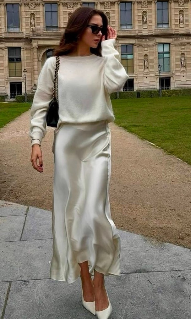 Ivory sweater 
Ivory silk skirt 
Ivory pumps 
Black bag 

#LTKSpringSale #LTKStyleTip #LTKWorkwear