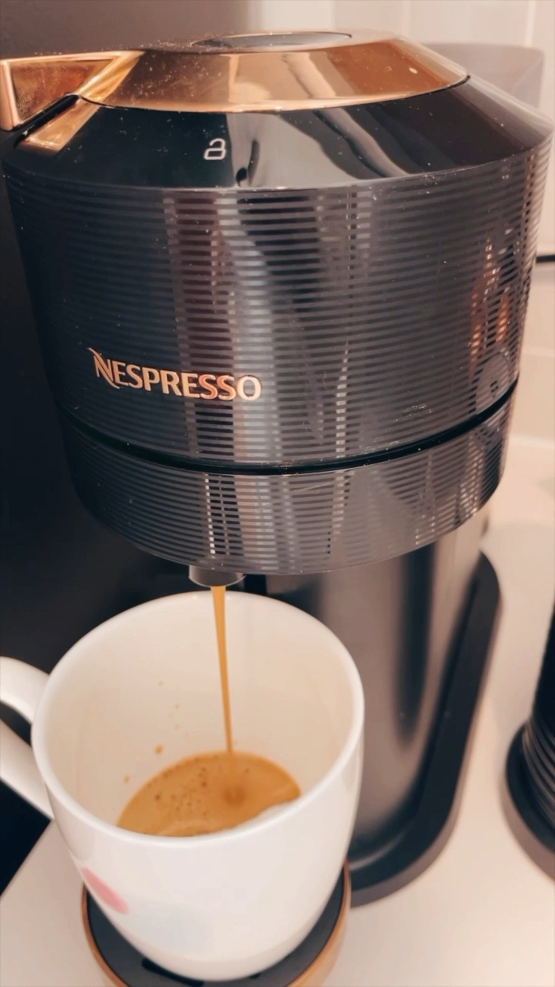 The best Nespresso on sale! Comes with frother and pods. DIY coffee at home  

#LTKHome #LTKSaleAlert #LTKFamily