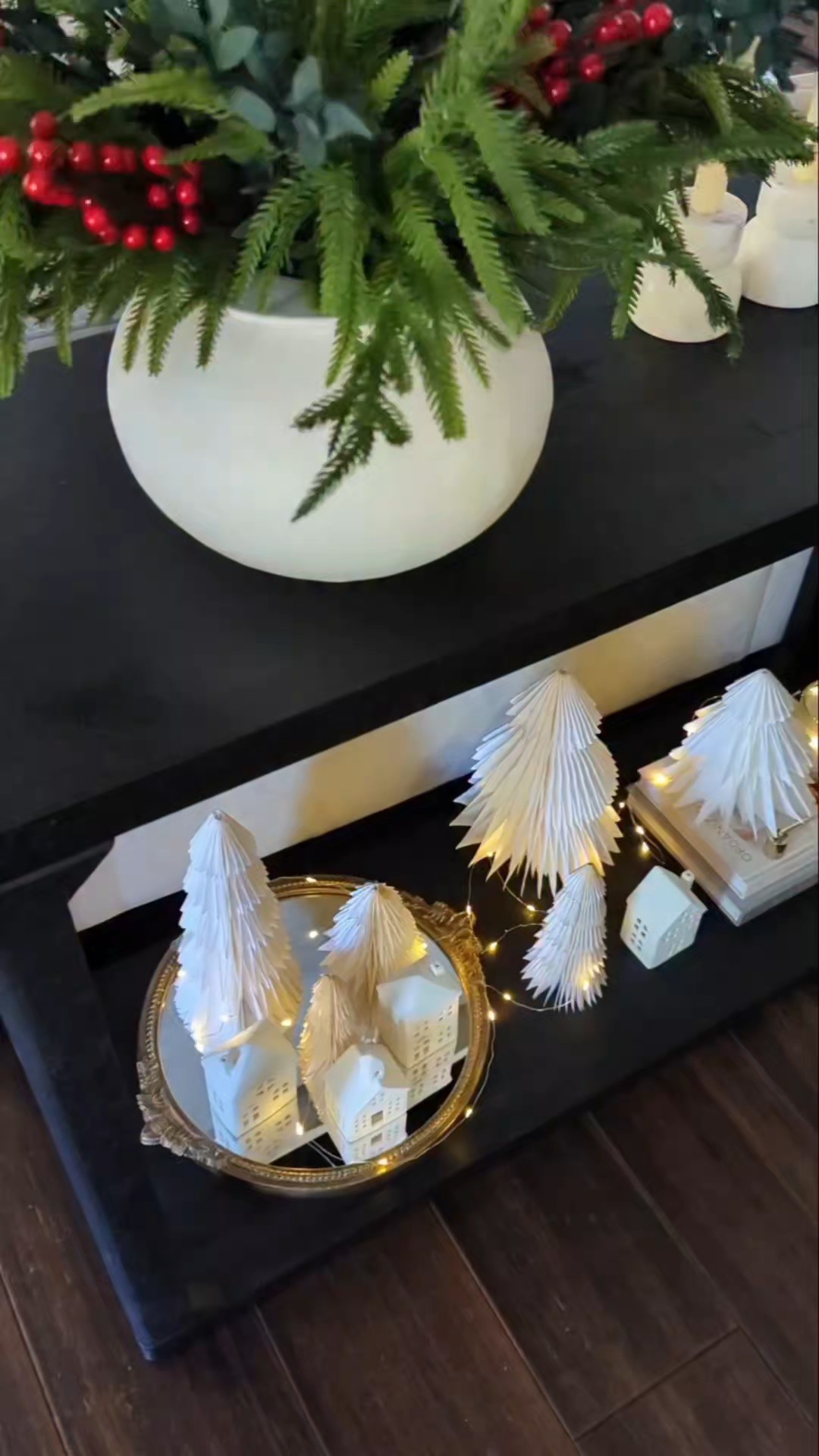 Simple and af Christmas village. Paper Christmas trees. Mini ceramic houses from TJ Maxx. Twinkly lights. Books. Tray. Candles. Snuffer. #Christmas #LTKfind

#LTKSeasonal #LTKHoliday #LTKmomlife