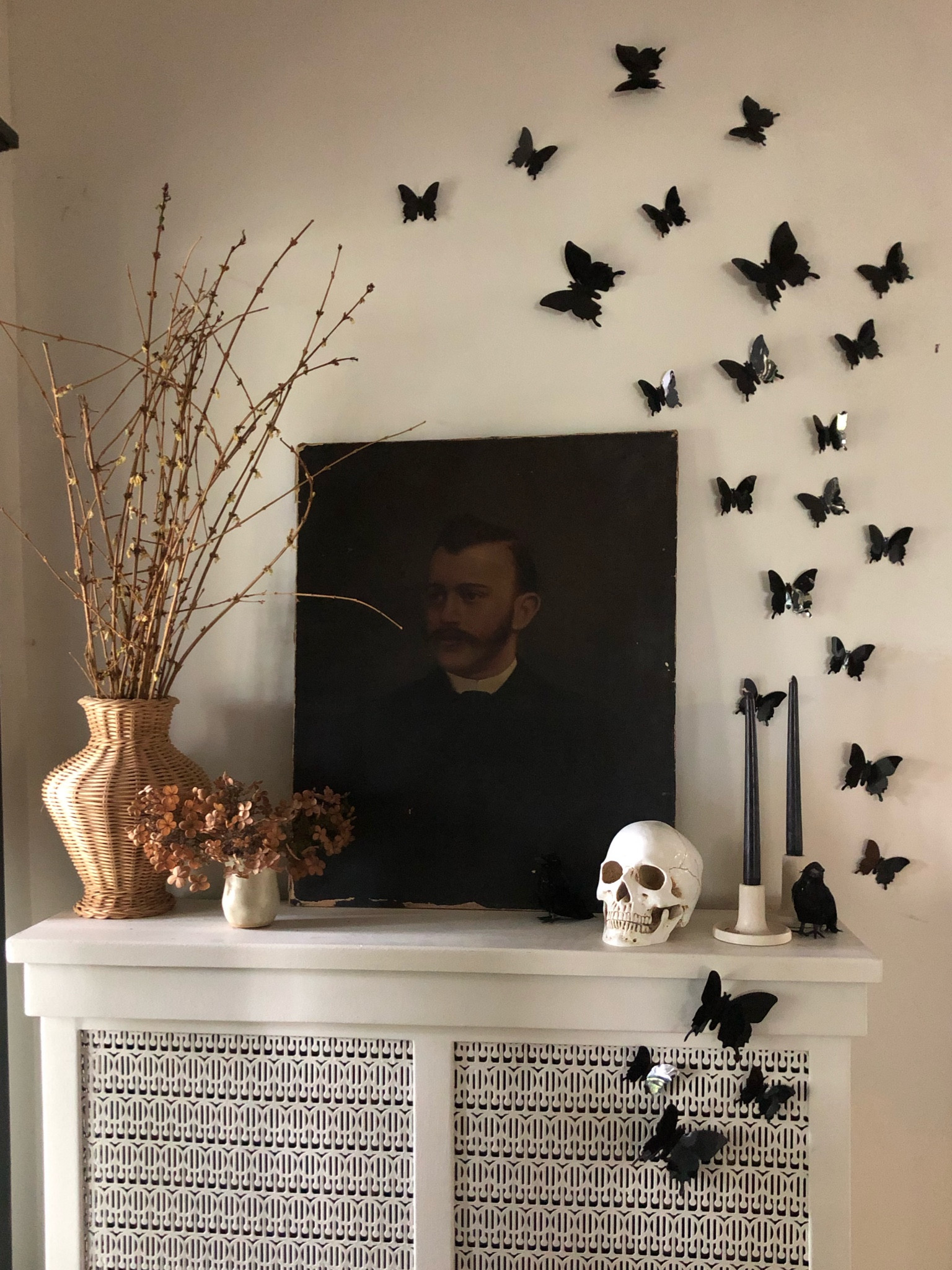 Sprinkling a little Halloween here and there. Love how this vintage portrait brought this space to the next level. I linked a few look a likes below! 