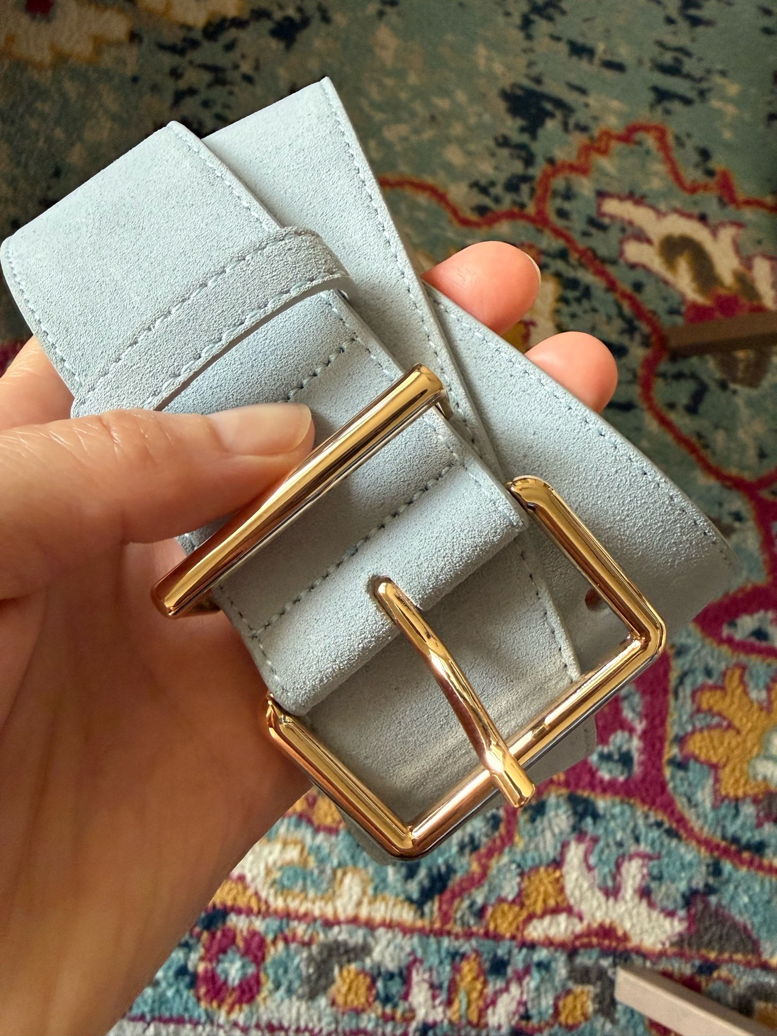 Light blue suede belt. Solid. Great quality. It also comes in taupe. Only $20!