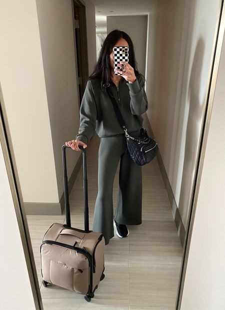 Travel outfit. Pullover top and wide leg pants true to size. Code NAOMIXSPANX to save. Crossbody bag. Sneakers make great travel shoes; true to size. Travel bag. Rolling bag fits under airplane seat as a carry on bag  

#LTKstyletip #LTKtravel #LTKitbag