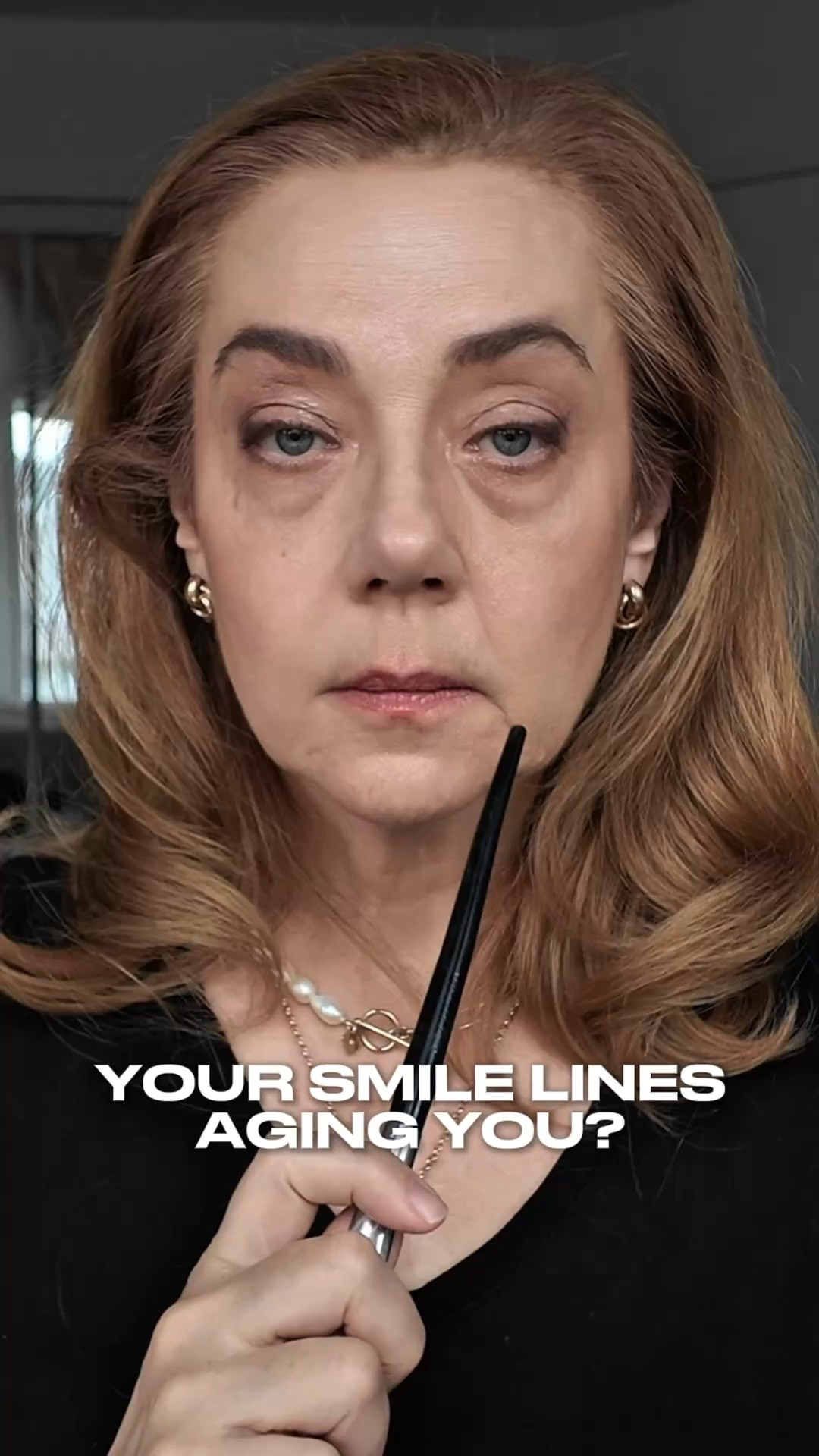 Smile lines aging you? Here’s a simple makeup trick that uses the principle of light and shadow.

When a line or indentation is deep, adding light can help soften its appearance. That’s why I apply a matte highlighter directly into the smile line before concealer.

My steps:

✨ Multi-balm first to hydrate the area and help prevent creasing and caking

✨ Matte highlighter to brighten the indentation

✨ Concealer that’s slightly lighter than your skin tone. Wait a couple minutes for concealer to set before blending

✨ Brightening or translucent powder to set

✨ Finishing spray to lock everything in place

I used Ilia Beauty Cornstarch Powder, but any good setting powder can work.

Do your smile lines aging you? Will you try this technique?
Comment below ⬇️

Save this for your next makeup day and share it with a friend. 
Follow for more easy beauty and style tips for women over 50.

#smilelines #matureskinmakeup #makeuptipsforwomenover50 #concealertips #everydaymakeup