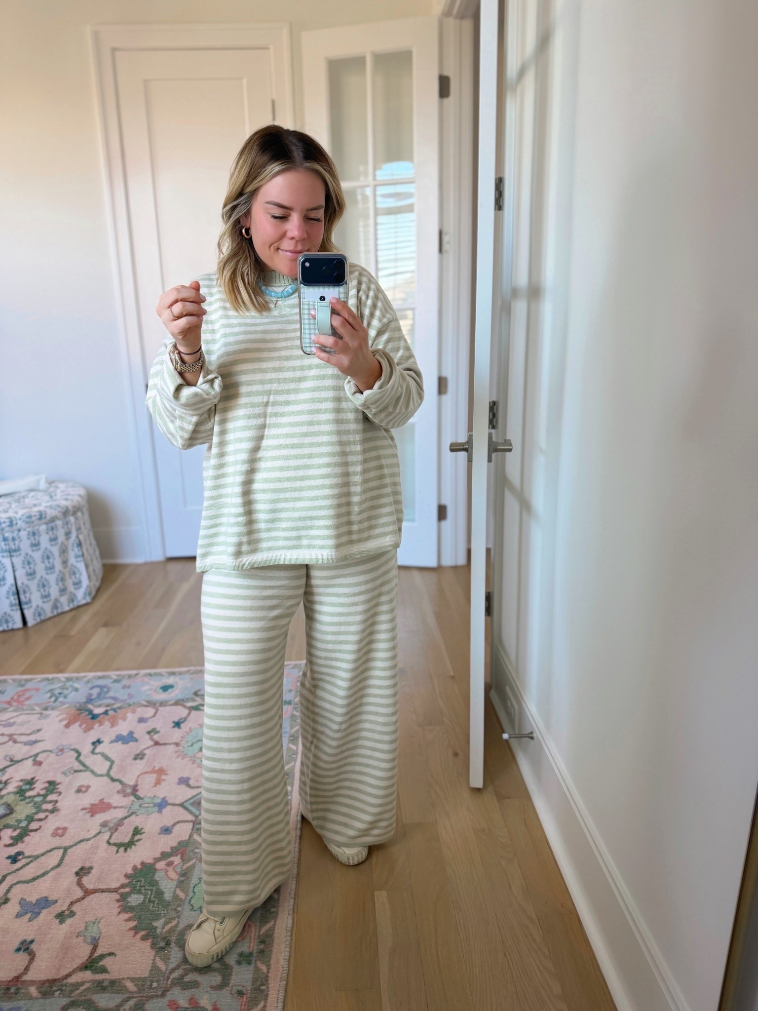 L in both cozy pieces 